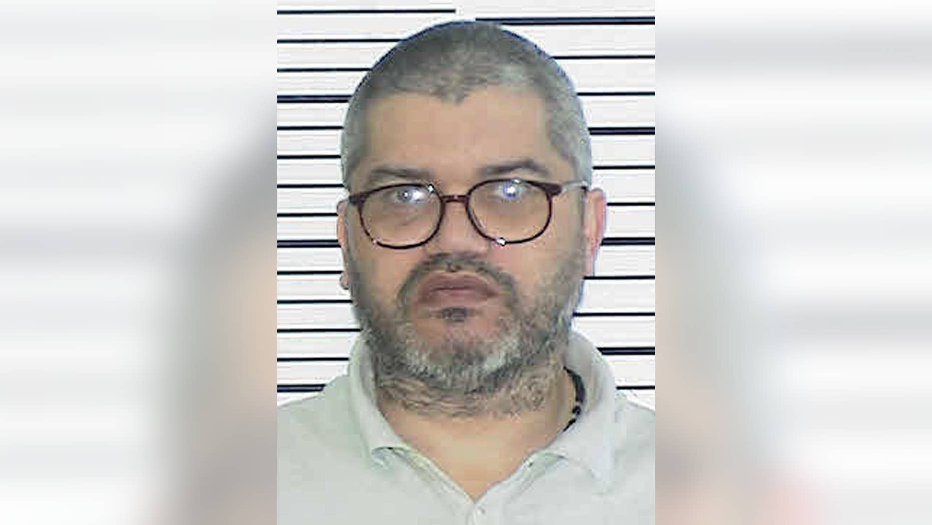 This undated photo provided by the Bronx County District Attorney's office in New York shows Leonardo Espinal. The 49-year-old Bronx man has been sentenced to 20 years to life in prison for lacing his children's pizza with rat poison after he discovered that his ex-wife was seeing another man. Prosecutors say Leonardo Espinal was sentenced on Thursday after pleading guilty last month to the 2012 murder of his 5-year-old son and the attempted murder of his 7-year-old daughter. (AP Photo/Bronx County District Attorney's office)