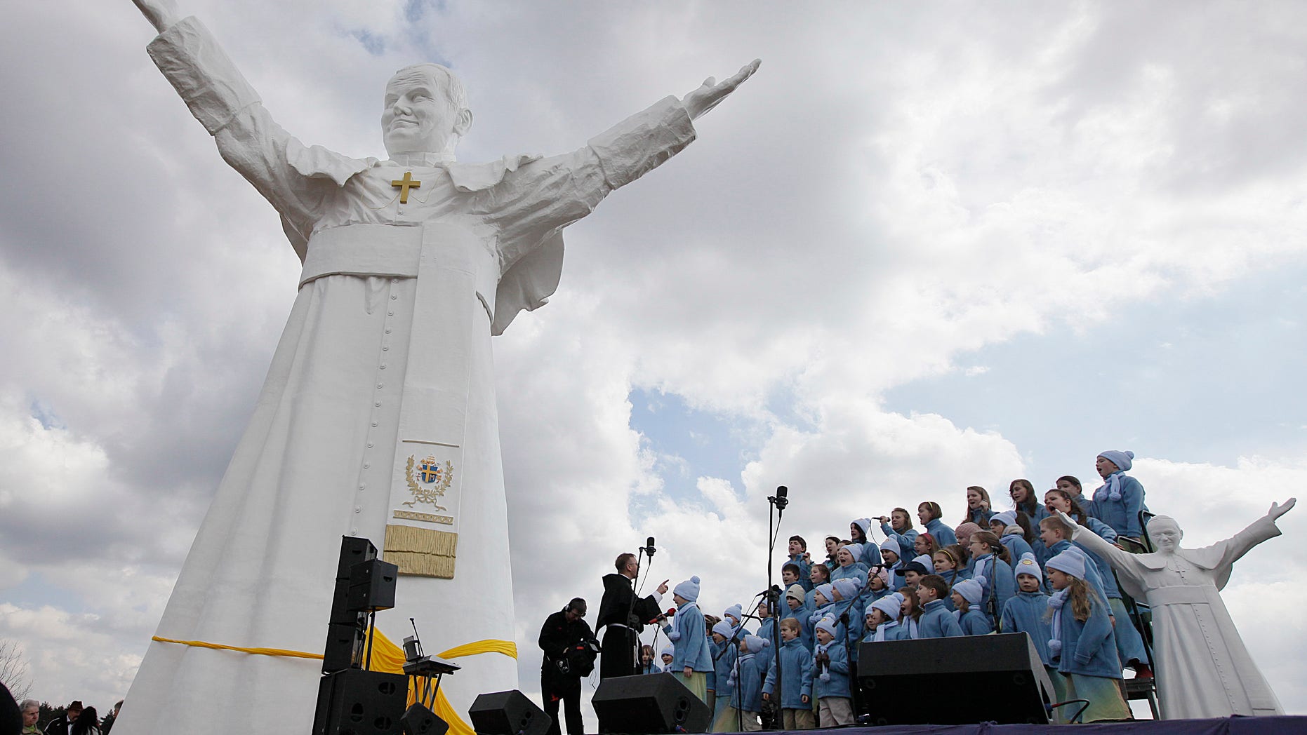 April 13, 2013: A children's choir takes part in the unveiling ceremony of the statue of the late Pope John Paul II in Czestochowa, Poland.