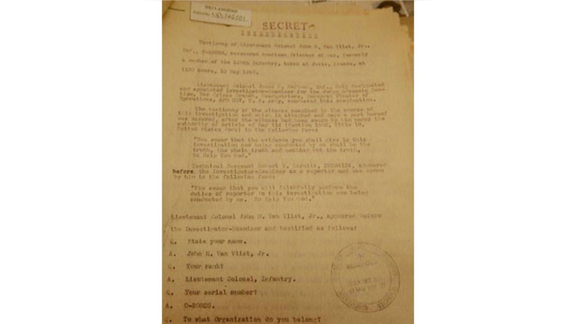 January 8, 2014: This picture shows a copy of the first page of what is believed recently uncovered vital testimony made in 1945 in Paris by U.S. Lt. Col. John H. Van Vliet Jr. It provides evidence of Soviet responsibility for the World War II massacre of some 22,000 Polish officers in Katyn forest and other locations in then-Soviet Union. (AP)
