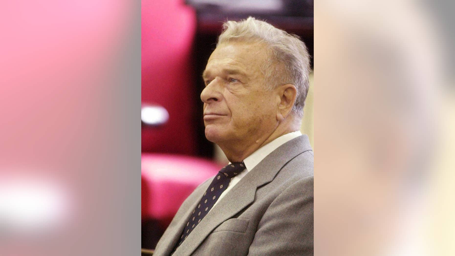 FILE--In this June 20, 2001 file photo former communist interior minister Gen. Czeslaw Kiszczak listens to proceedings before a court in Warsaw, Poland. Kiszczak, a top communist-era official who played a key role in the imposition of martial law in 1981 in Poland, has died Thursday, Nov. 5, 2015. He was 90. (AP Photo/Czarek Sokolowski, file )