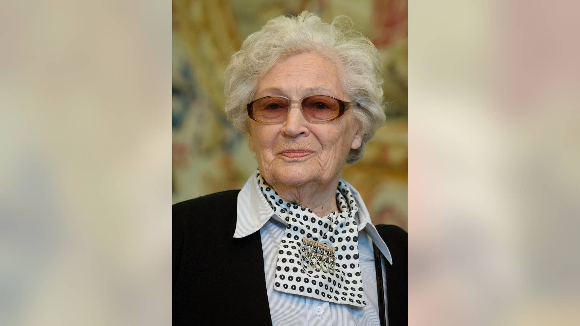 FILE - In this March 19, 2012 file photo Jadwiga Pilsudska-Jaraczewska attends a ceremony at the Belweder Palace in Warsaw. Pilsudska-Jaraczewska, a World War II pilot and a daughter of Marshal Jozef Pilsudski, the father of Poland's independence, died on Nov. 16, 2014. She was 94. (AP Photo/Str)