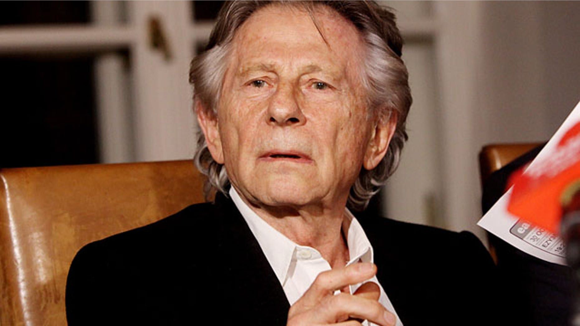 FILE - In this Oct. 30, 2015 file photo filmmaker Roman Polanski tells reporters he can breath with relief after a Polish judge ruled that the law forbids his extradition to the U.S., where in 1977 he pleaded guilty to having sex with a minor. (AP Photo/Jarek Praszkiewicz, file)