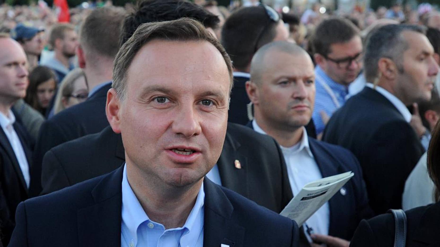FILE - This Aug. 1, 2015, file photo shows Polish President-elect, Andrzej Duda at the Pilsudski square on the 71st anniversary of the insurgency, in Warsaw, Poland. It’s been a dream of some Polish leaders for nearly a century: an alliance of Eastern European countries running from the Baltic Sea down to the Black Sea that would keep Russia at bay. Poland’s conservative new president, Duda, who took office two weeks ago, has already signaled that building such an alliance under Warsaw’s leadership will be a priority of his presidency. (AP Photo/Alik Keplicz, File)