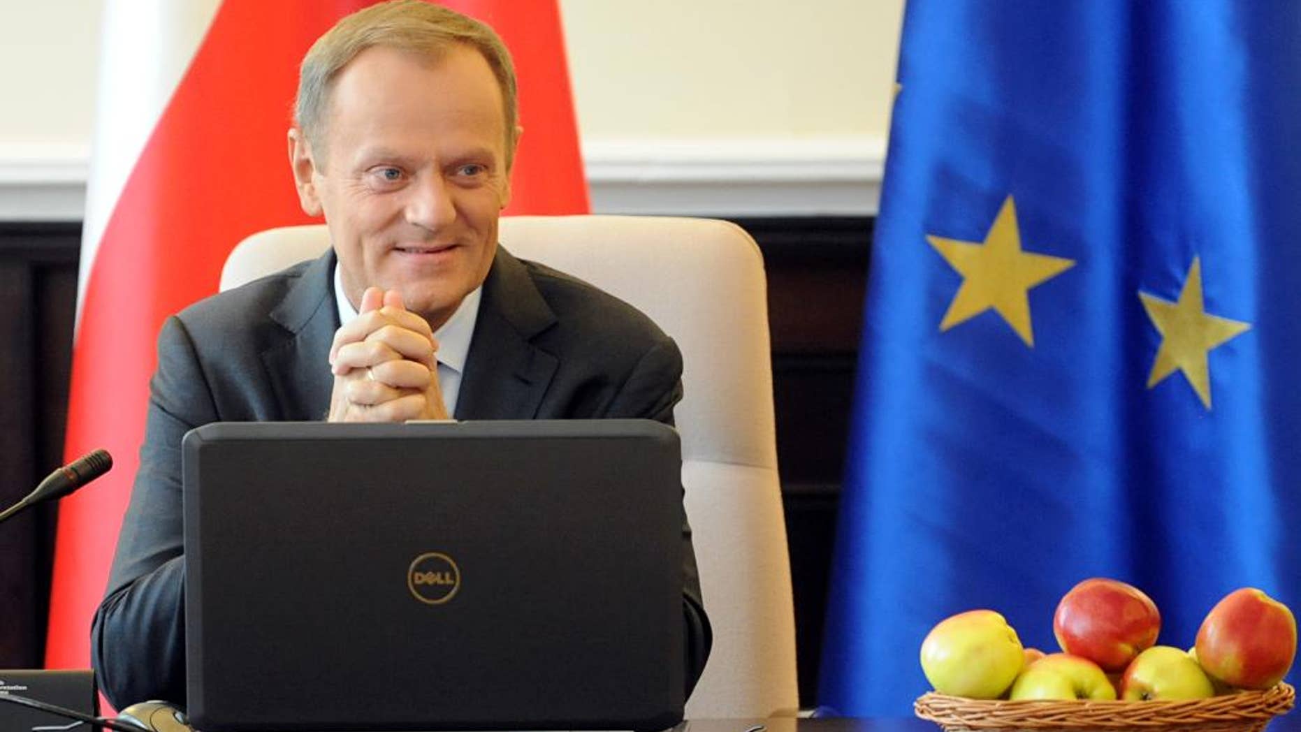 Polish Prime Minister Donald Tusk opens a government meeting in Warsaw, Poland, Tuesday, Sept. 2, 2014. Tusk was chosen by EU leaders to be the next president of the European Council. (AP Photo/Alik Keplicz)