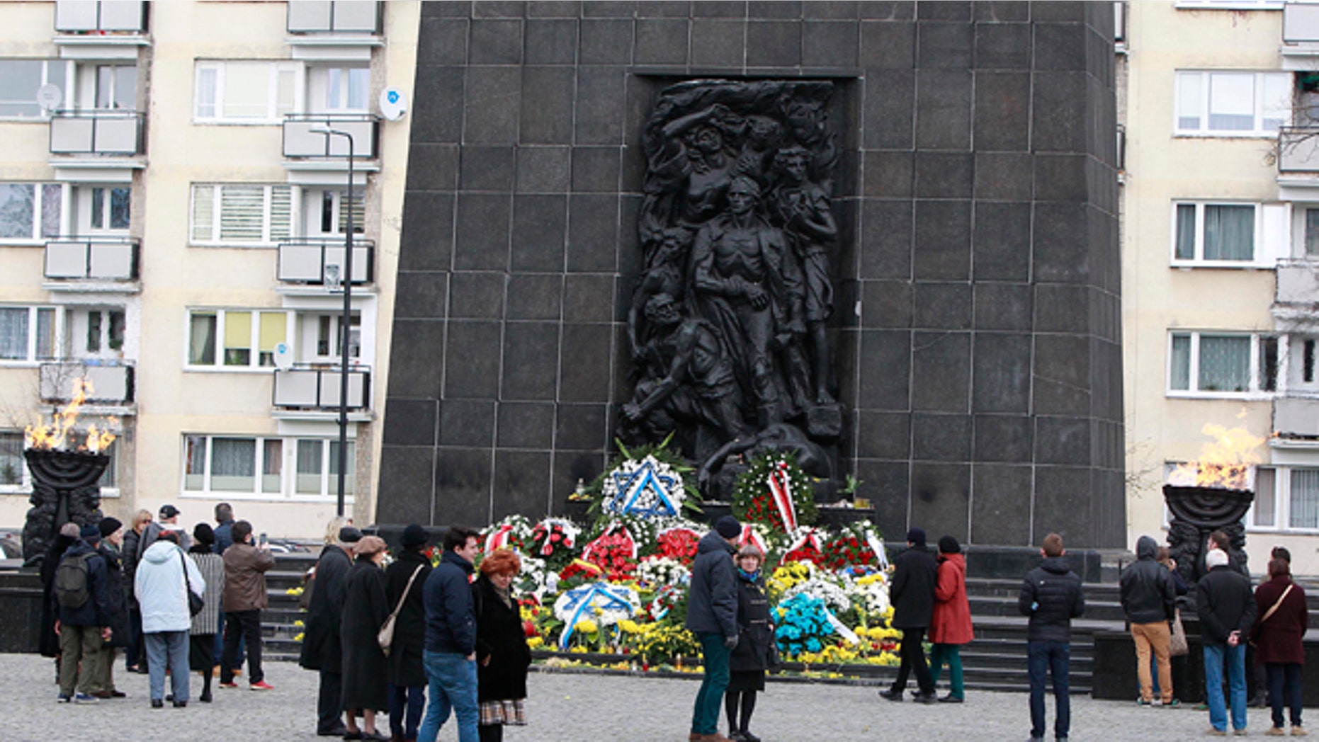 April 19, 2015: People gather in front of the monument to the Heroes of the Ghetto, on the 72nd anniversary of the Warsaw Ghetto Uprising, in Warsaw. (AP Photo/Czarek Sokolowski)
