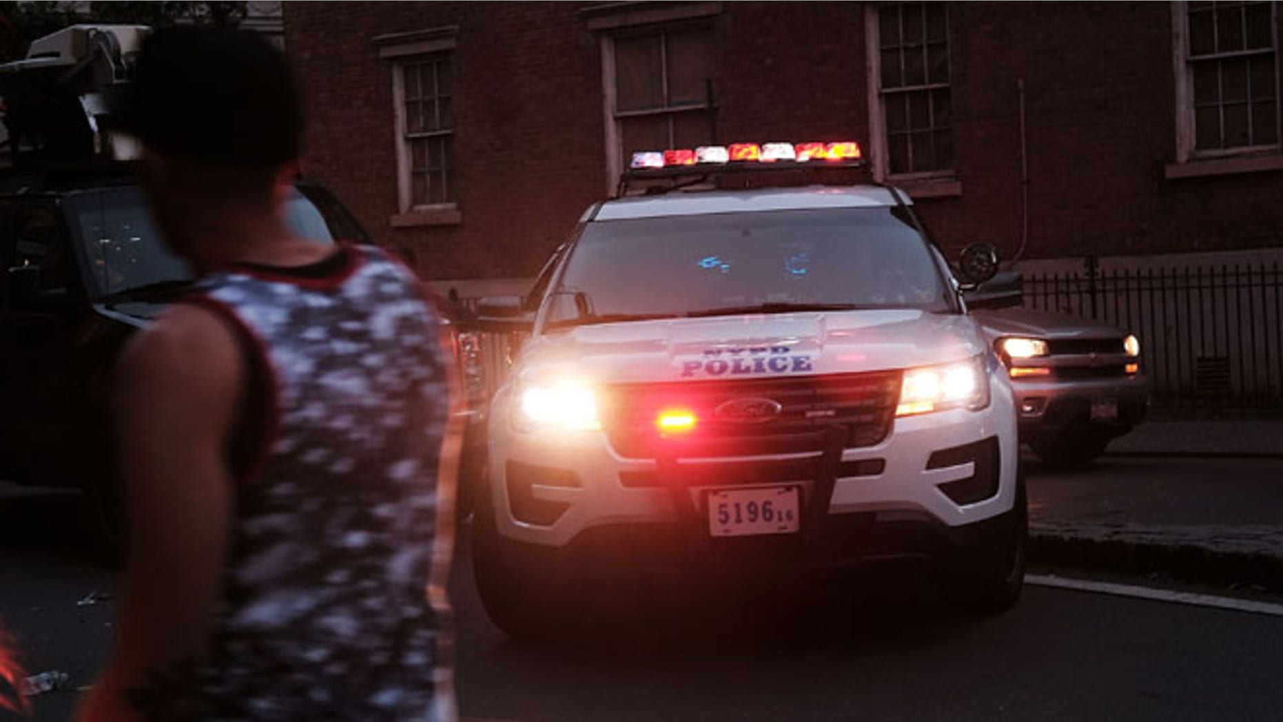 NEW YORK, NY - JUNE 12: A heavy police presence gathers near the iconic New York City gay and lesbian bar The Stonewall Inn to following the mass killings in Orlando last evening on June 12, 2016 in New York City. An American-born man who'd recently pledged allegiance to ISIS killed 50 people early Sunday at a gay nightclub in Orlando, Florida. The massacre was the deadliest mass shooting in the United States. (Photo by Spencer Platt/Getty Images)