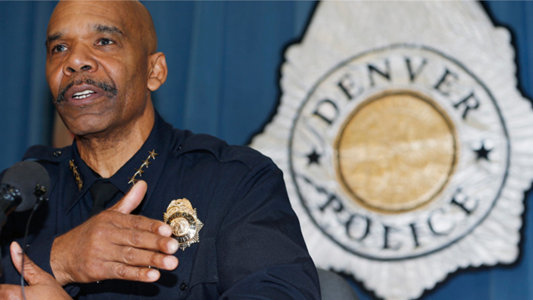 Jan. 29, 2015: Denver Police Department Chief Robert White responds to questions during a news conference about the death of a 17-year-old woman who was killed after she allegedly hit and injured a Denver Police Department officer while driving a stolen vehicle early Monday in a northeast Denver alley. (AP Photo/David Zalubowski)