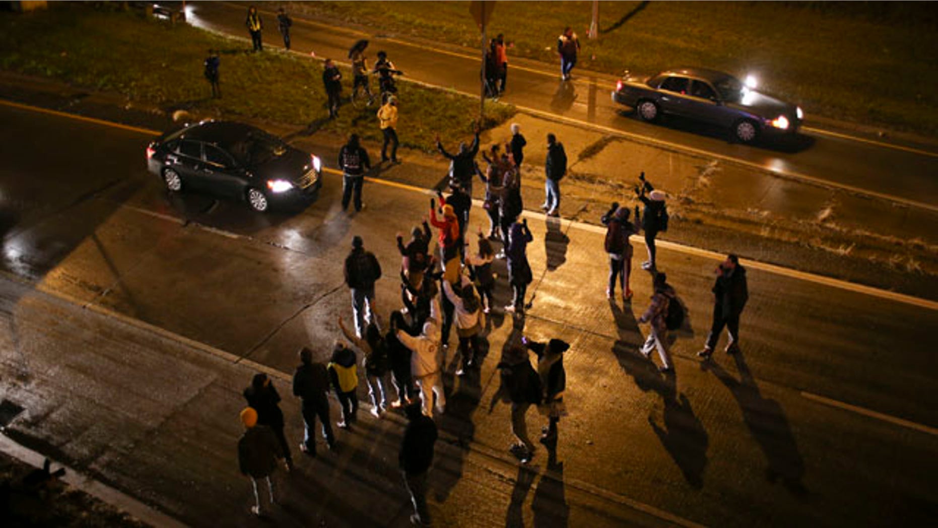 Nov. 16, 2015: Marchers stop traffic on an entrance ramp to westbound Interstate 94 in Minneapolis before moving to the main freeway. The mayor of Minneapolis on Monday asked for a federal civil rights investigation into the weekend shooting of a black man by a police officer during an apparent struggle.(Jeff Wheeler/Star Tribune via AP)