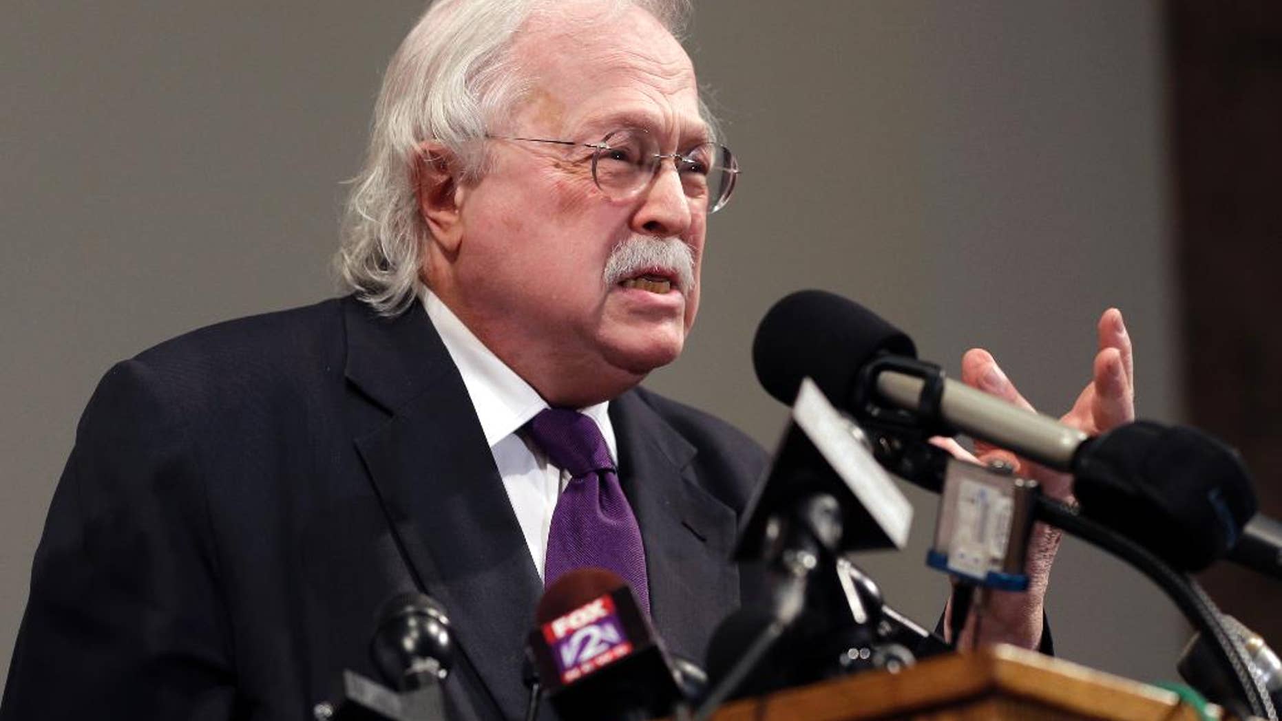 Former New York City chief medical examiner Dr. Michael Baden speaks during a news conference to share preliminary results of a second autopsy done on Michael Brown Monday, Aug. 18, 2014, in St. Louis County, Mo. The independent autopsy shows 18-year-old Michael Brown was shot at least six times. (AP Photo/Jeff Roberson)