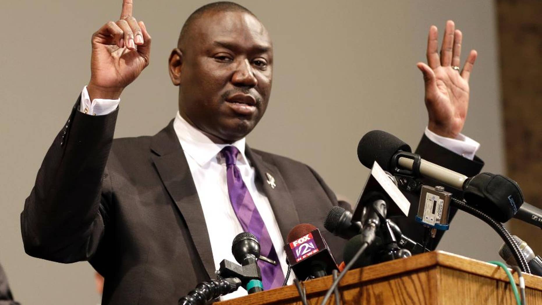 FILE - In this Monday, Aug. 18, 2014, file photo, Brown family attorney Benjamin Crump speaks during a news conference in St. Louis County, Mo. Legal experts say a cellphone video that shows a witness raising his hands in the air immediately after the fatal shooting of Michael Brown in Ferguson appears to support previous accounts and could bolster arguments that Brown was surrendering when he was shot. Crump said the video is "the best evidence you can have other than a video of the actual shooting itself." (AP Photo/Jeff Roberson, File)