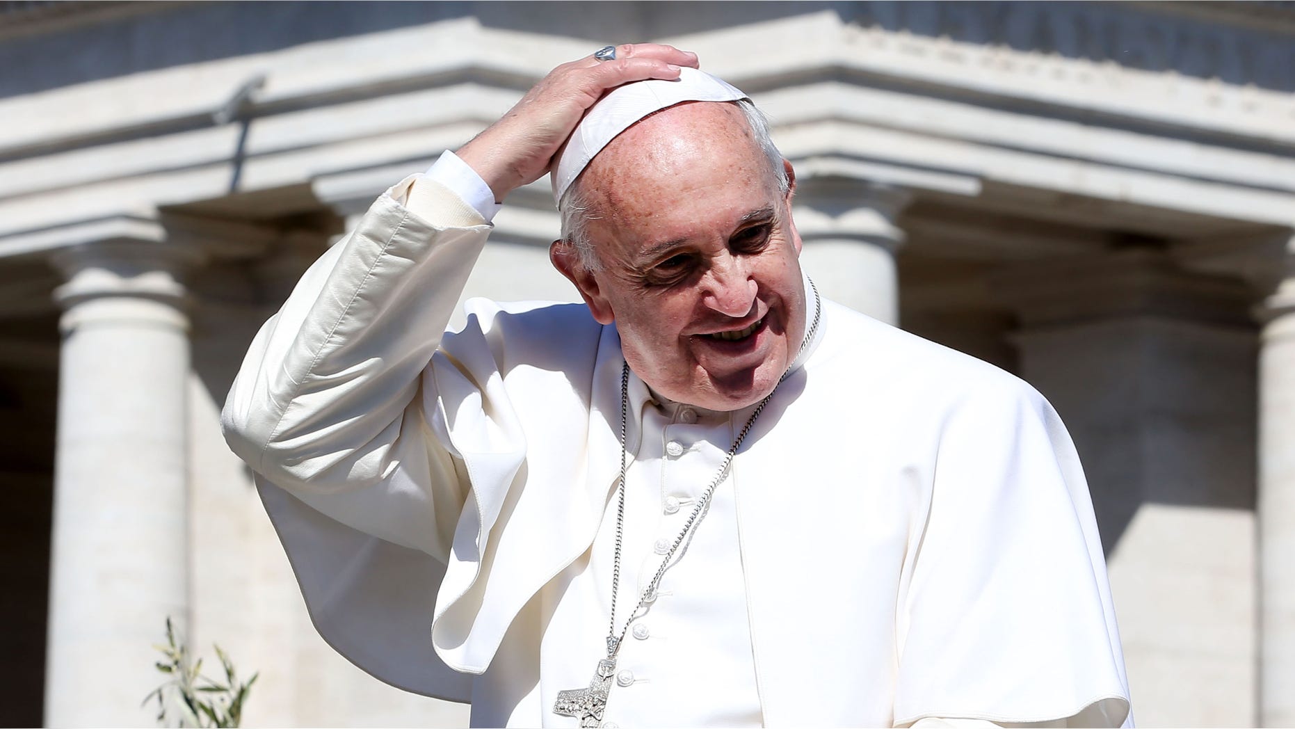 VATICAN CITY, VATICAN - MARCH 29: Pope Francis waves to the faithful as he leaves St. Peter's Square at the the end of Palm Sunday Mass on March 29, 2015 in Vatican City, Vatican. On Palm Sunday Christians celebrate Jesus' arrival into Jerusalem, where he was put to death. It marks the official beginning of Holy Week during which Christians observe the death of Christ before celebrations begin on Easter. (Photo by Franco Origlia/Getty Images)