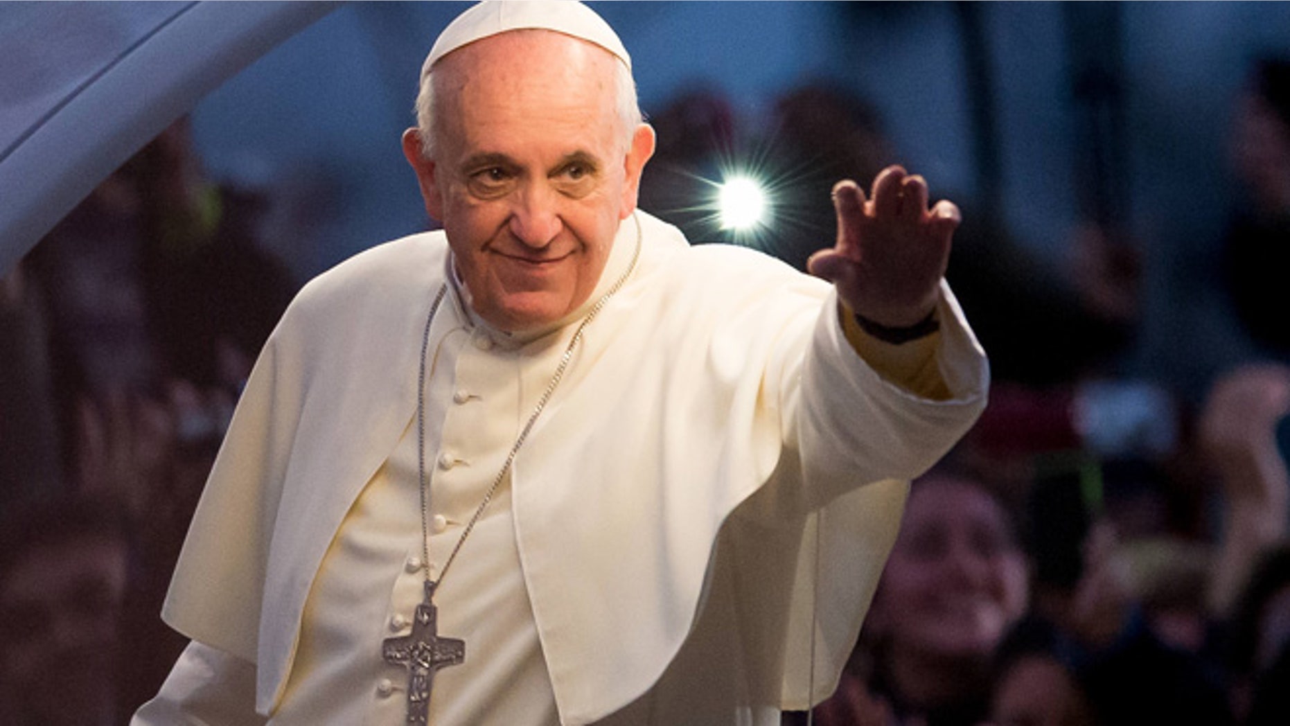 RIO DE JANEIRO, BRAZIL - JULY 26: Pope Francis waves from the Popemobile on his way to attend the Via Crucis on Copacabana Beach during World Youth Day celebrations on July 26, 2013 in Rio de Janeiro, Brazil. More than 1.5 million pilgrims are expected to join the pontiff for his visit to the Catholic Church's World Youth Day celebrations which is running July 23-28. (Photo by Buda Mendes/Getty Images)