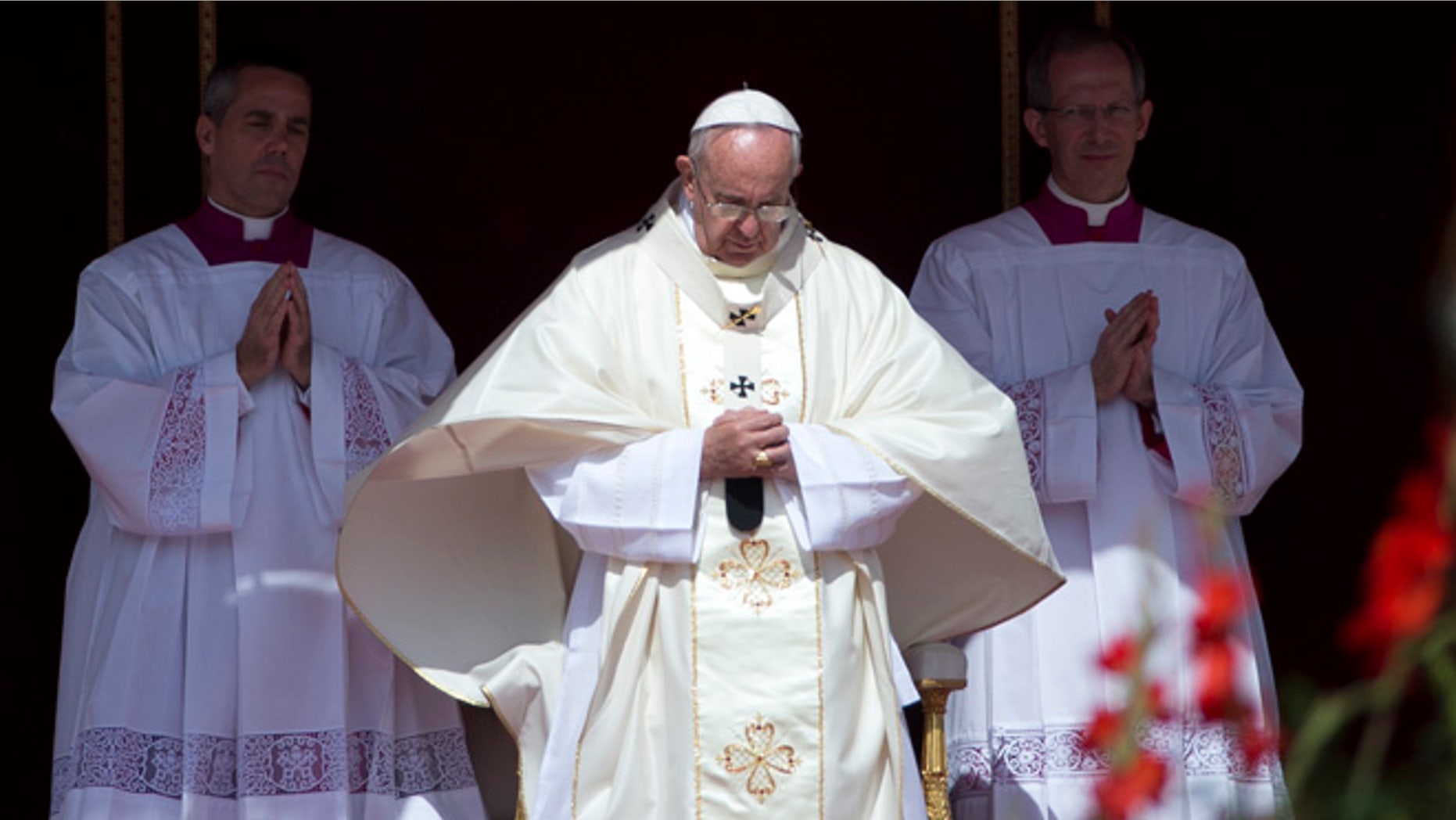 Pope Francis arrives to celebrate a canonization ceremony of four new saints in St. Peter's Square at the Vatican, Sunday, May 17, 2015. Among them are Arab nuns Sts. Mariam Bawardy and Marie Alphonsine Ghattas, who lived in what was Ottoman-ruled Palestine in the 19th century. (AP Photo/Alessandra Tarantino)