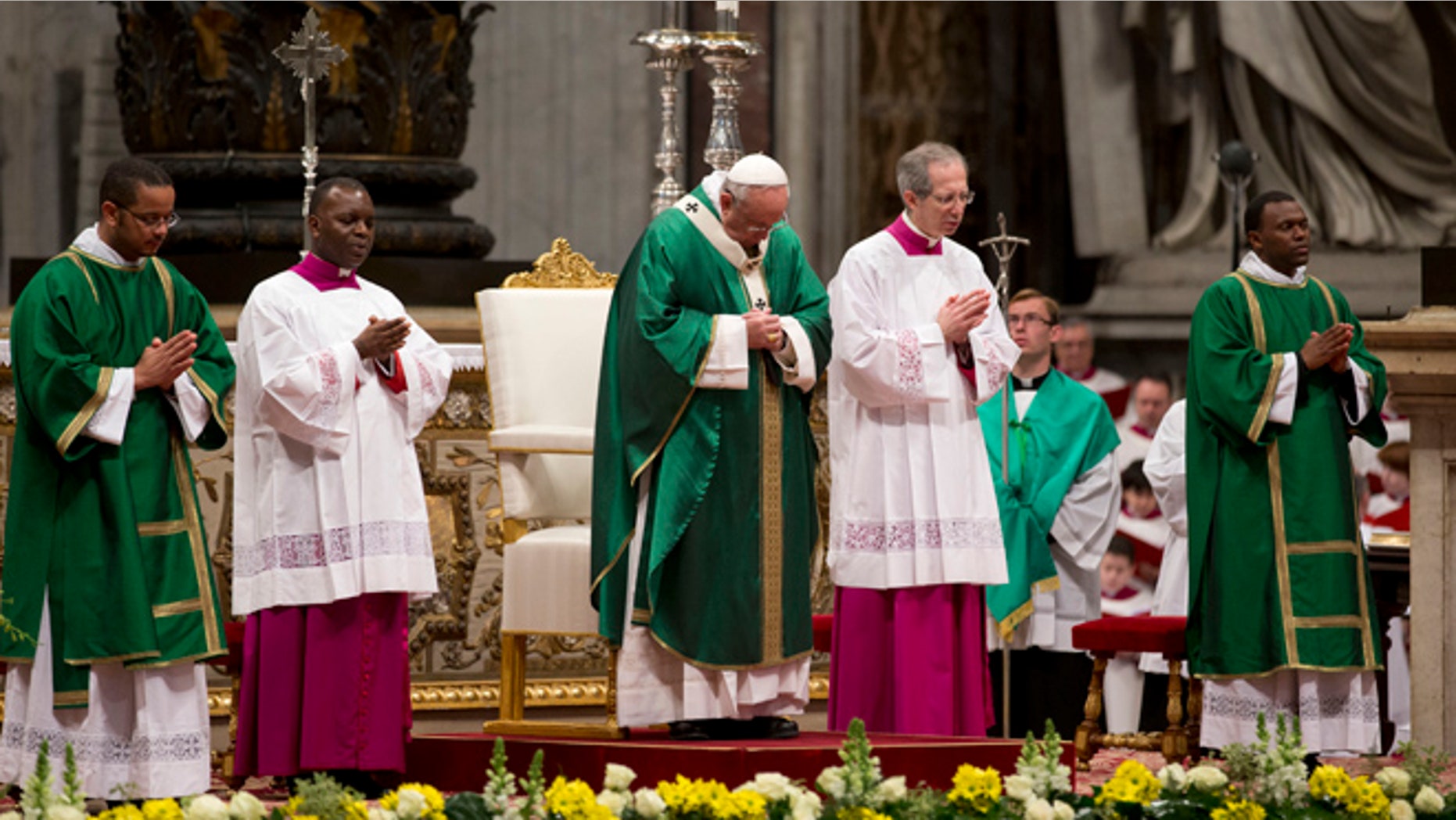 Pope Francis celebrates a Mass for newly-elected cardinals, in St. Peter's Basilica at the Vatican, Sunday, Feb. 15, 2015. Pope Francis welcomed 20 new cardinals Saturday into the elite club of churchmen who will elect his successor and immediately delivered a tough-love message to them, telling them to put aside their pride, jealousy and self-interests and instead exercise perfect charity. (AP Photo/Andrew Medichini)