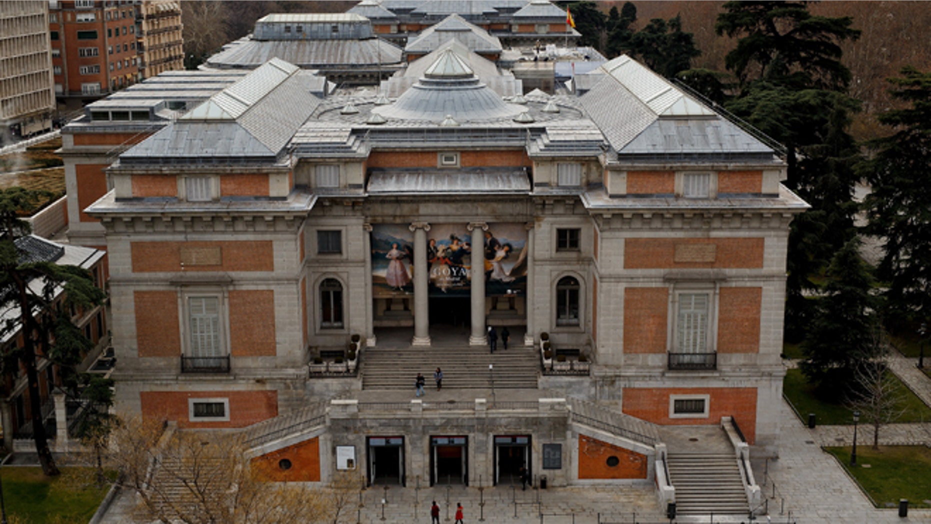 People walk around The Prado Museum in Madrid, Spain. (Photo by Pablo Blazquez Dominguez/Getty Images)