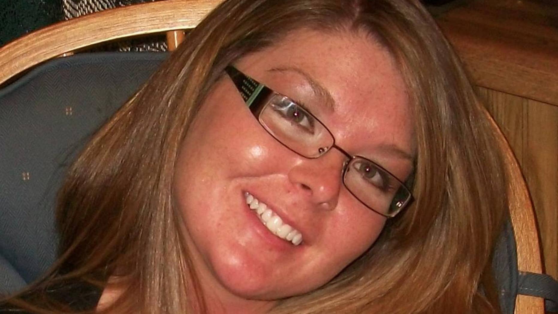 This undated image released by the Techel family via the Iowa attorney general's office shows Lisa Techel. A defense for Seth Techel, charged with killing his pregnant wife Lisa Techel, asked jurors Wednesday, July 23, 2014, during his closing arguments to consider Techel's sobbing 911 calls he made as proof that he's not guilty. Prosecutors claim the Iowa man killed her so that he could be with another woman whom he had zealously pursued for months. Techel, 23, is on trial for a third time after two previous trials ended with hung juries. (AP Photo/Techel family via Iowa attorney general's office)