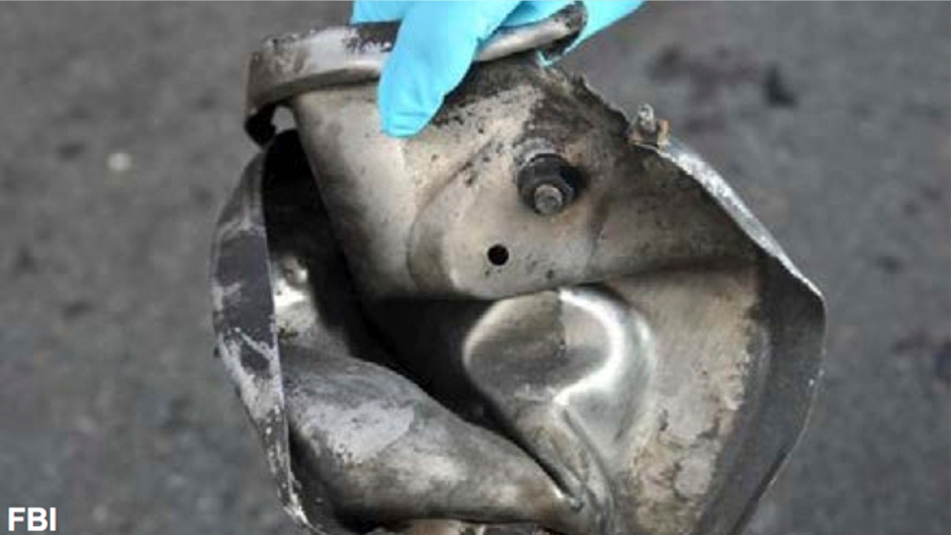 This image from a FBI and Homeland Security joint bulletin issued to law enforcement and obtained by The Associated Press, shows the remains of a pressure cooker that the FBI says was part of one of the bombs that exploded during the Boston Marathon.