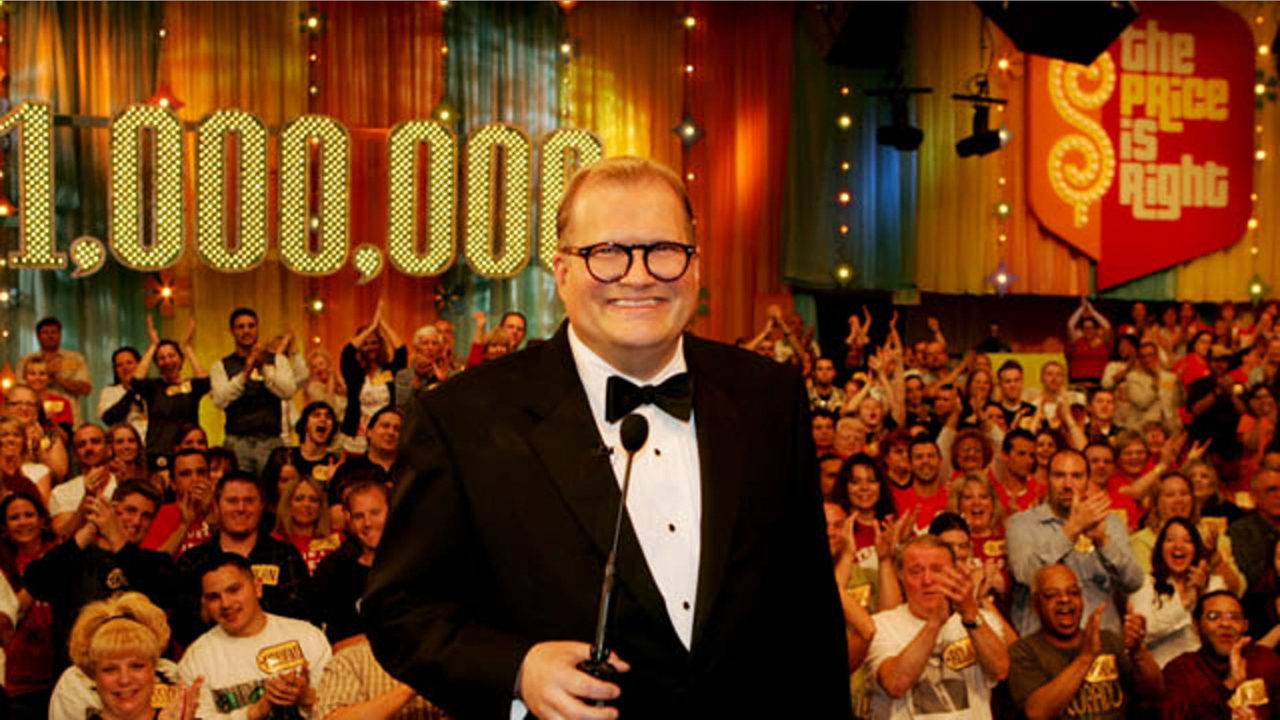 In this February 2008 publicity image released by CBS Entertainment, host Drew Carey hosts pauses during a taping of of "The Price is Right Million Dollar Spectacular."