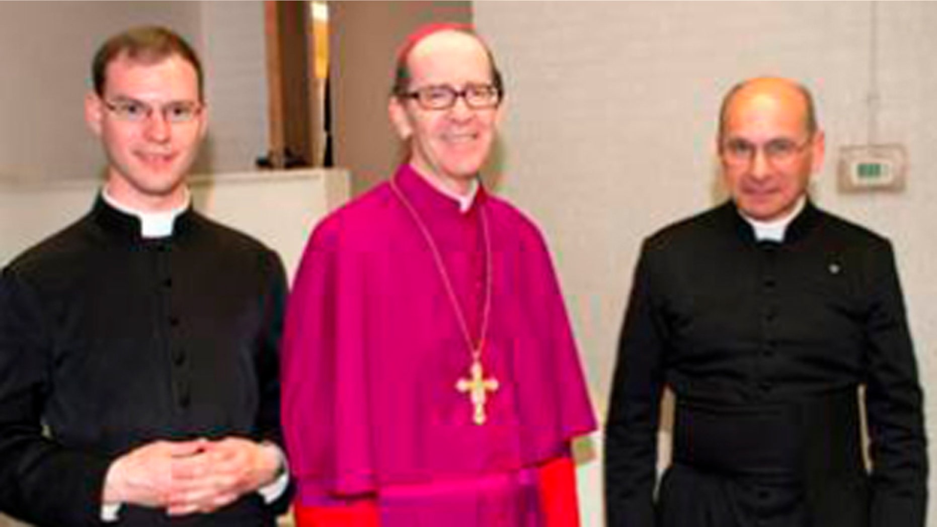 From the left, Fr. Kenneth Walker, Bishop Thomas J. Olmsted of the Diocese of Phoenix and Fr. Joseph Terra, are seen here in this undated photo.