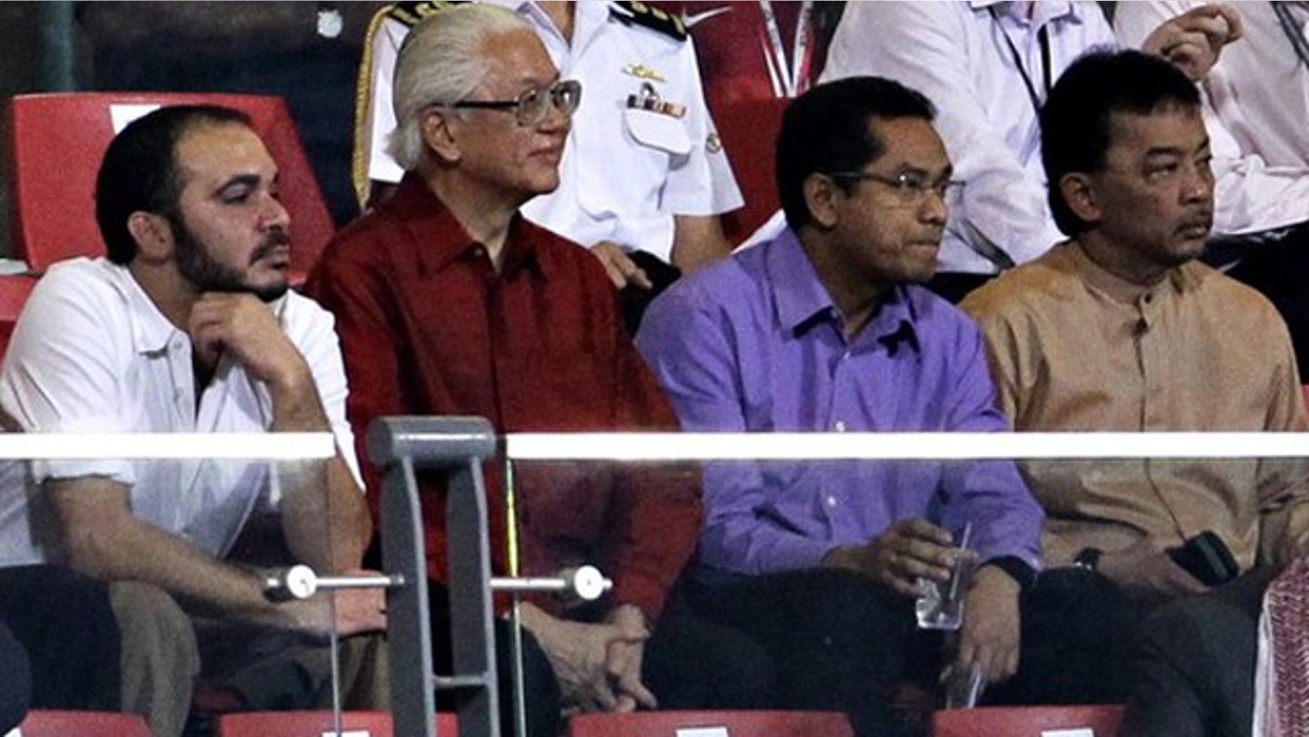 Oct. 11, 2011: Prince Ali Bin al Hussein of Jordan (L) watches as Jordan plays Singapore in their 2014 FIFA World Cup qualifying soccer match in Singapore with Singapore's President Tony Tan and Malaysia's Tengku Abdullah Sultan Ahmad Shah.