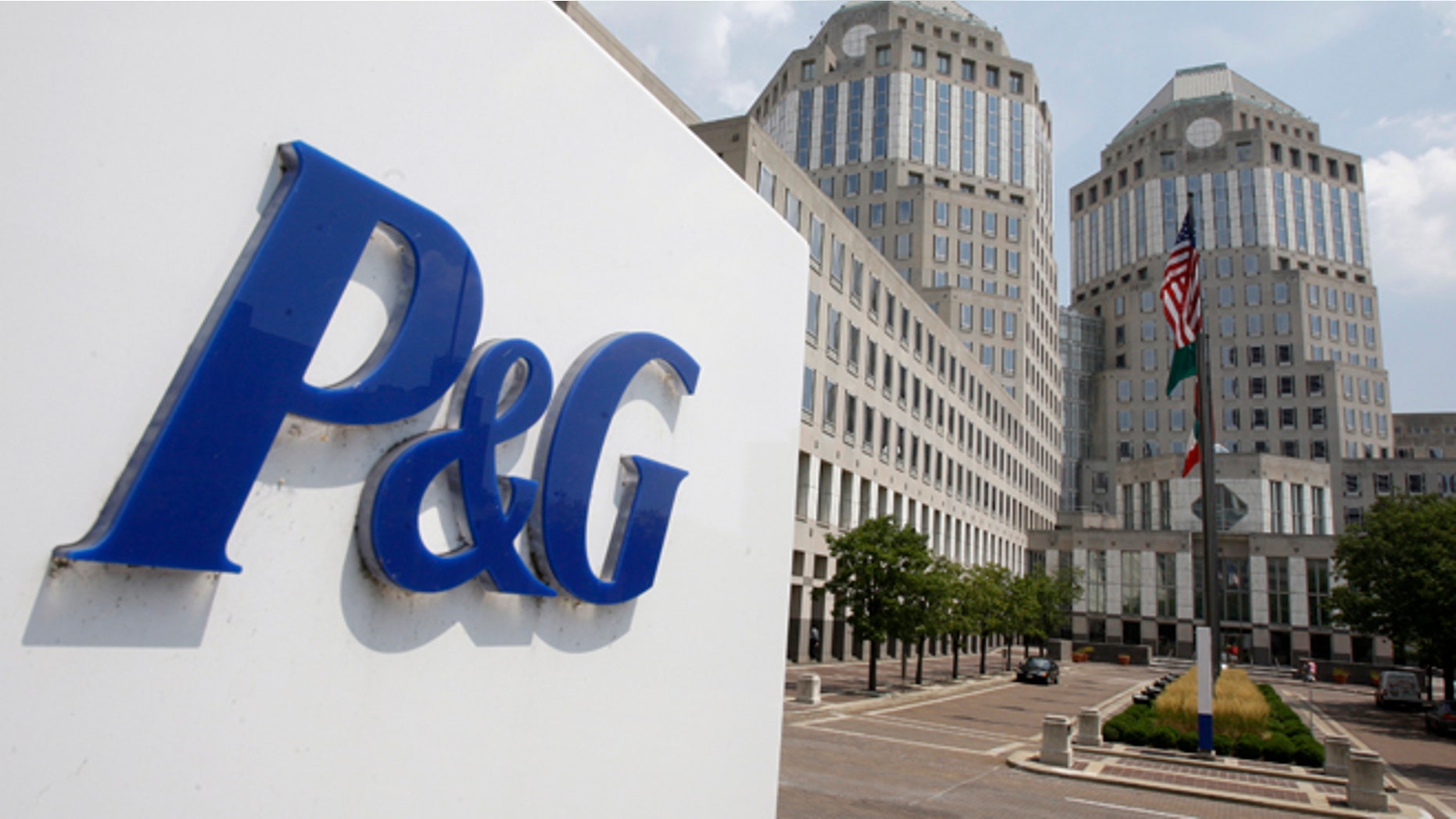 FILE - This Aug. 2, 2010, file photo, shows the Procter & Gamble Co. headquarters building in Cincinnati. Procter & Gamble took a hit from the strong dollar, like almost all U.S. companies with business overseas, pushing third-quarter revenue below expectations, the company reported Thursday, April 23, 2015. (AP Photo/Al Behrman, File)