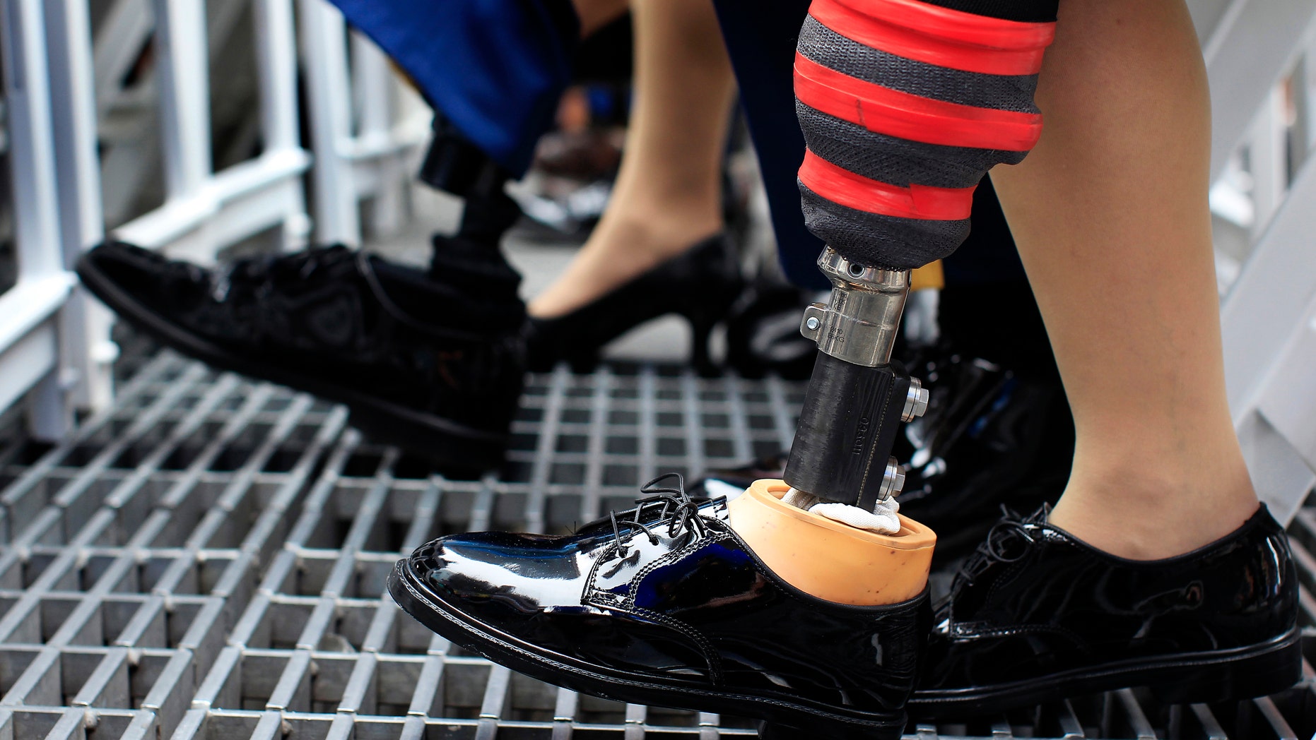 Prosthetic legs are seen on U.S. Army soldiers attending the Army's 237th anniversary celebrations at Times Square in New York.