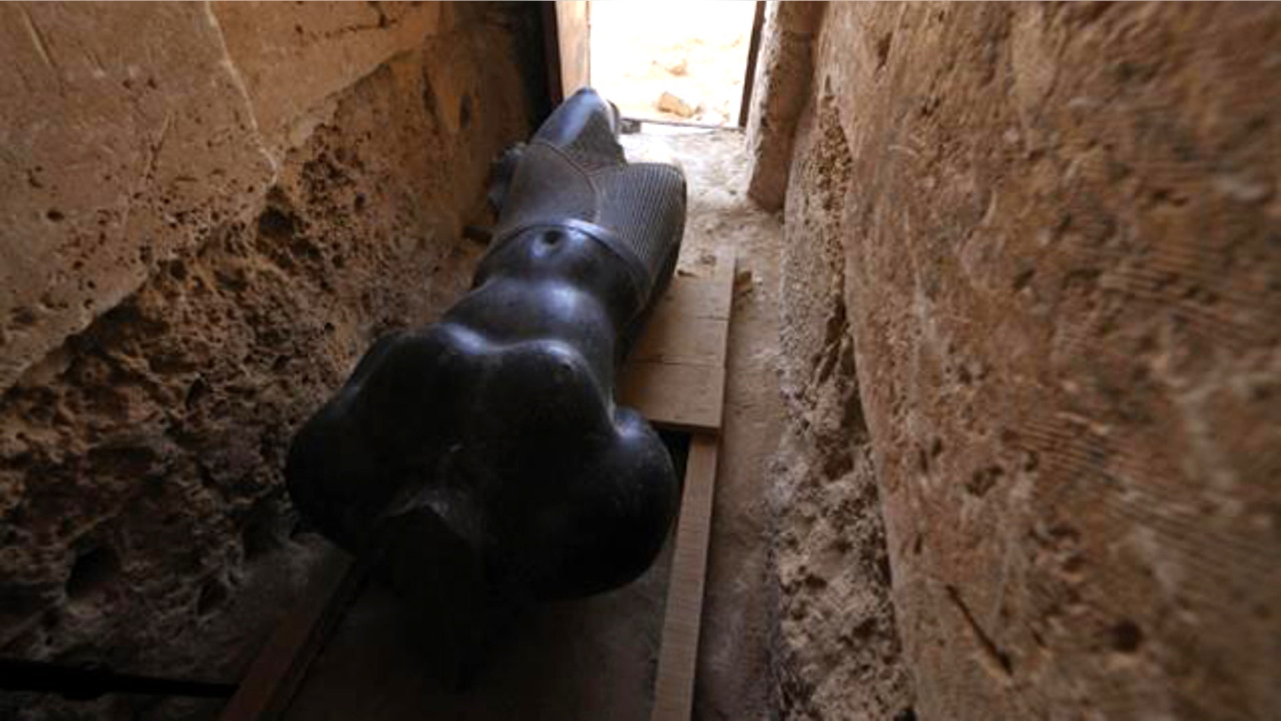 A large granite statue discovered at Taposiris Magna may represent an ancient king, Ptolemy IV.