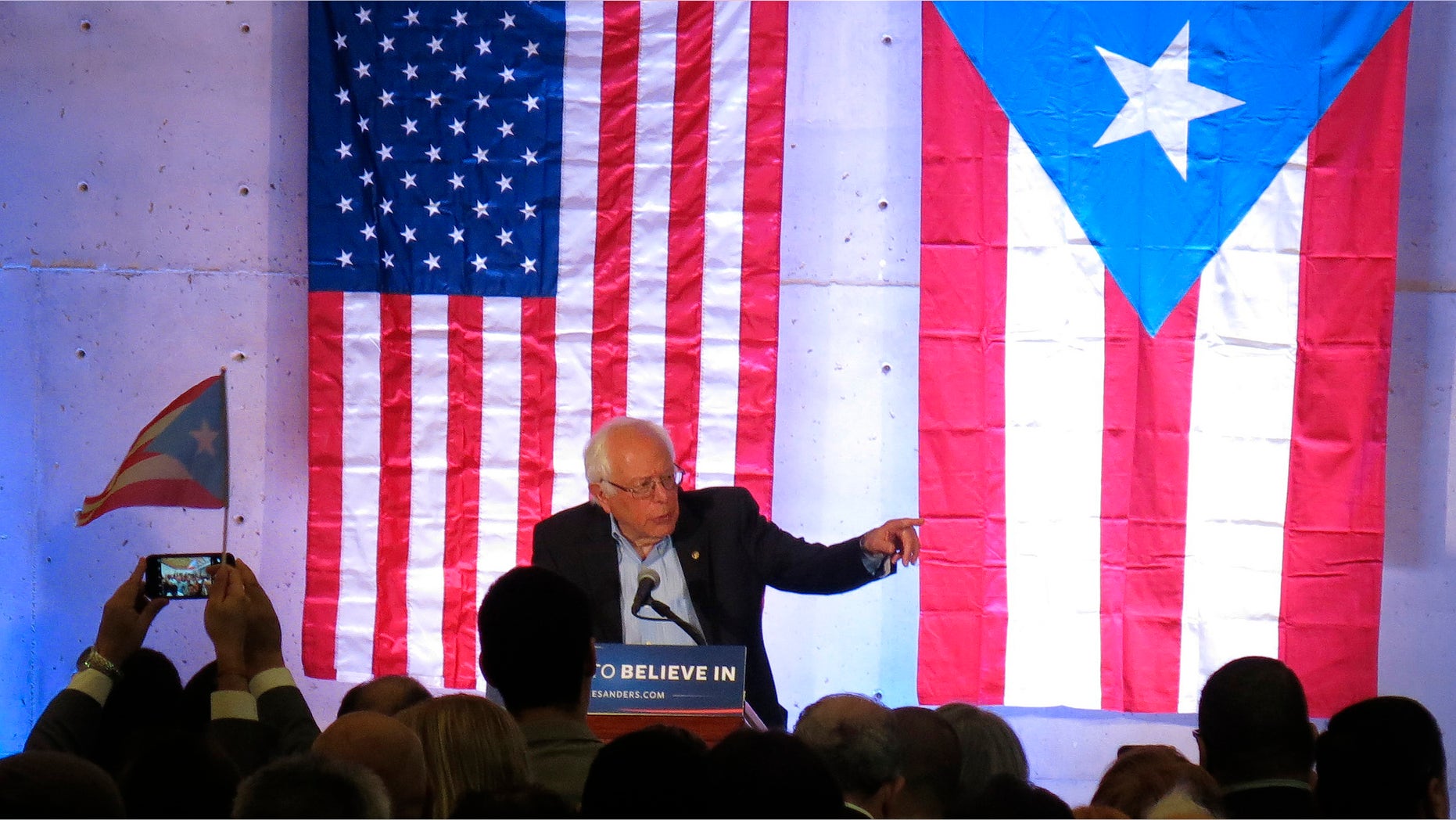 Democratic presidential candidate Sen. Bernie Sanders, I-Vt., holds a town hall meeting at the Luis Muñoz Marin Foundation in Trujillo Alto, Puerto Rico, Monday, May 16, 2016. Sanders arrived in Puerto Rico on Monday to talk about the U.S. territory's worsening debt crisis ahead of the June 5 primary. (AP Photo/Danica Coto)