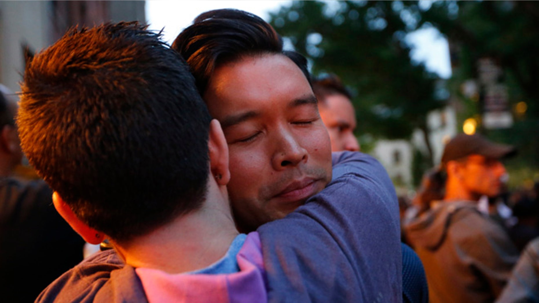 A vigil for victims of the Orlando nightclub shootings at the Stonewall Inn, a gay bar, Monday, June 13, 2016, in New York.