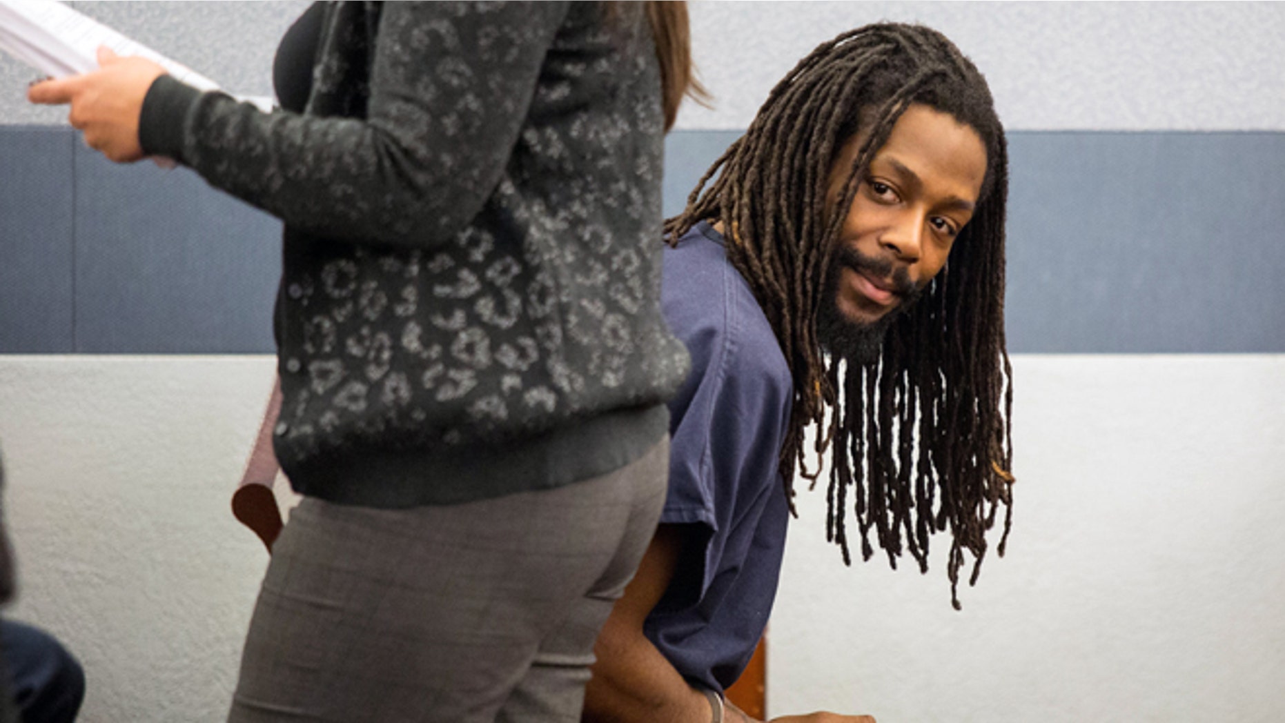 Feb. 21, 2014: Kirk Bills, 27, left, appears in court during his arrest warrant hearing at the Regional Justice Center in Las Vegas.