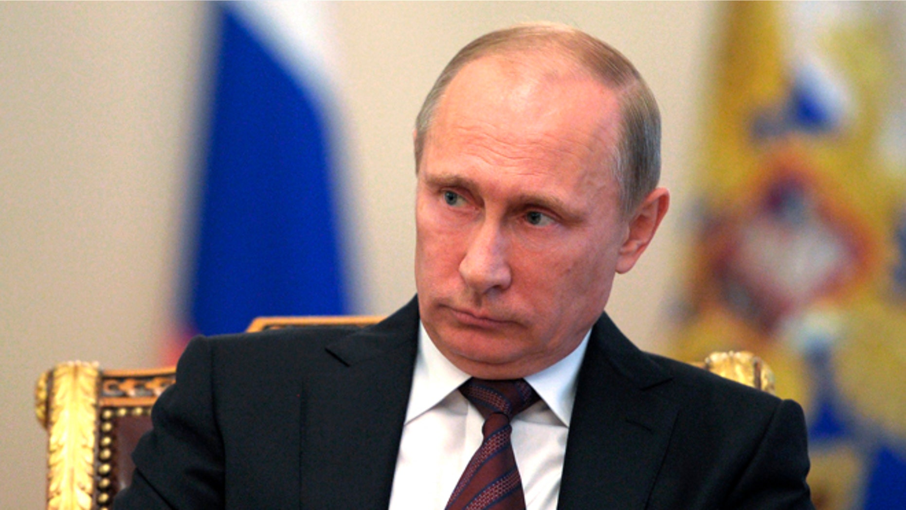 FILE: Sept. 2, 2013: Russian President Putin a meeting with Russian Parliament speakers at the Novo-Ogaryovo residence outside Moscow, Russia.