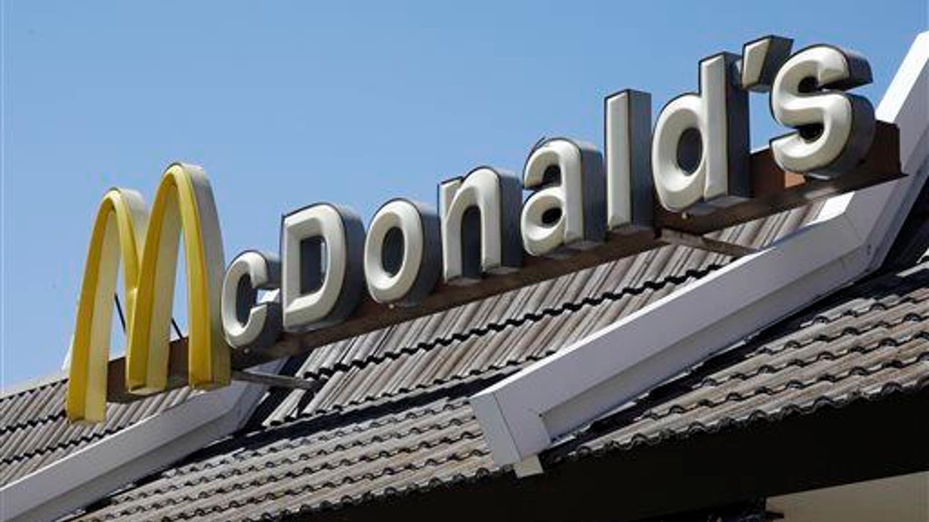In this Friday, April 20, 2012, file photo, a McDonald's sign is shown at a McDonald's restaurant in East Palo Alto, Calif.