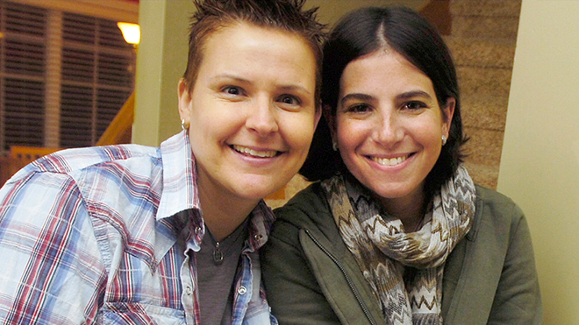 Feb. 5, 2015: In this 2011 file photo, Niki Quasney, left, poses for a photo with Amy Sandler, in Munster, Ind. Lambda Legal announced Sunday that Quasney of Munster died Thursday, Feb. 5, 2015. She was 38.