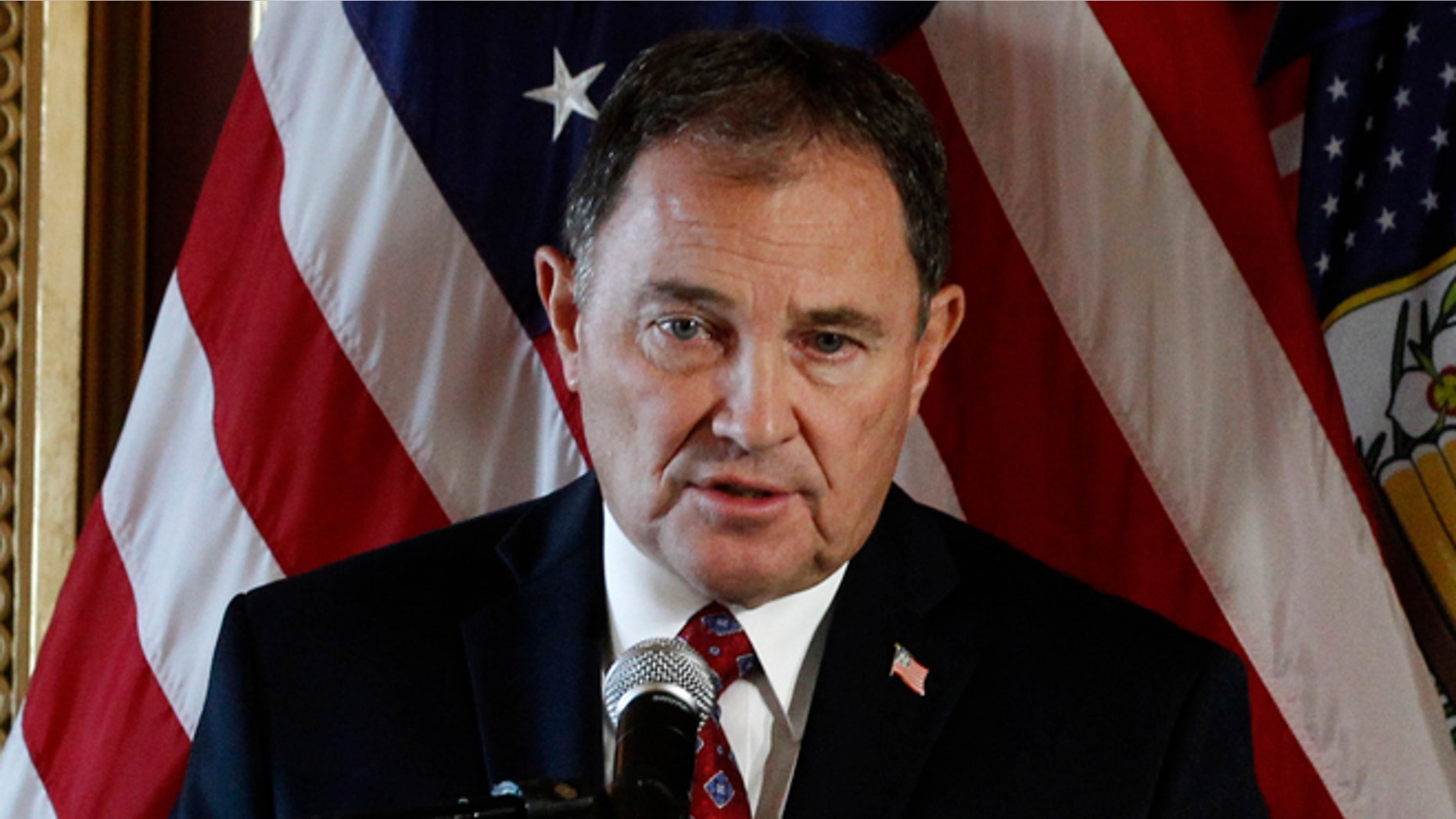SALT LAKE CITY, UT - OCTOBER 6: Utah Governor Gary Herbert, (L) and Utah Attorney General Sean Reyes, (R), talks to the press about the U.S. Supreme Court's decision on Utah's Gay Marriage ban on October 6, 2014 in Salt Lake City, Utah. The Governor ordered all state government agencies to start complying with the new ruling. The U.S. Supreme Court declined challenges including Utah's to gay marriage making it legal now in Utah. (Photo by George Frey/Getty Images