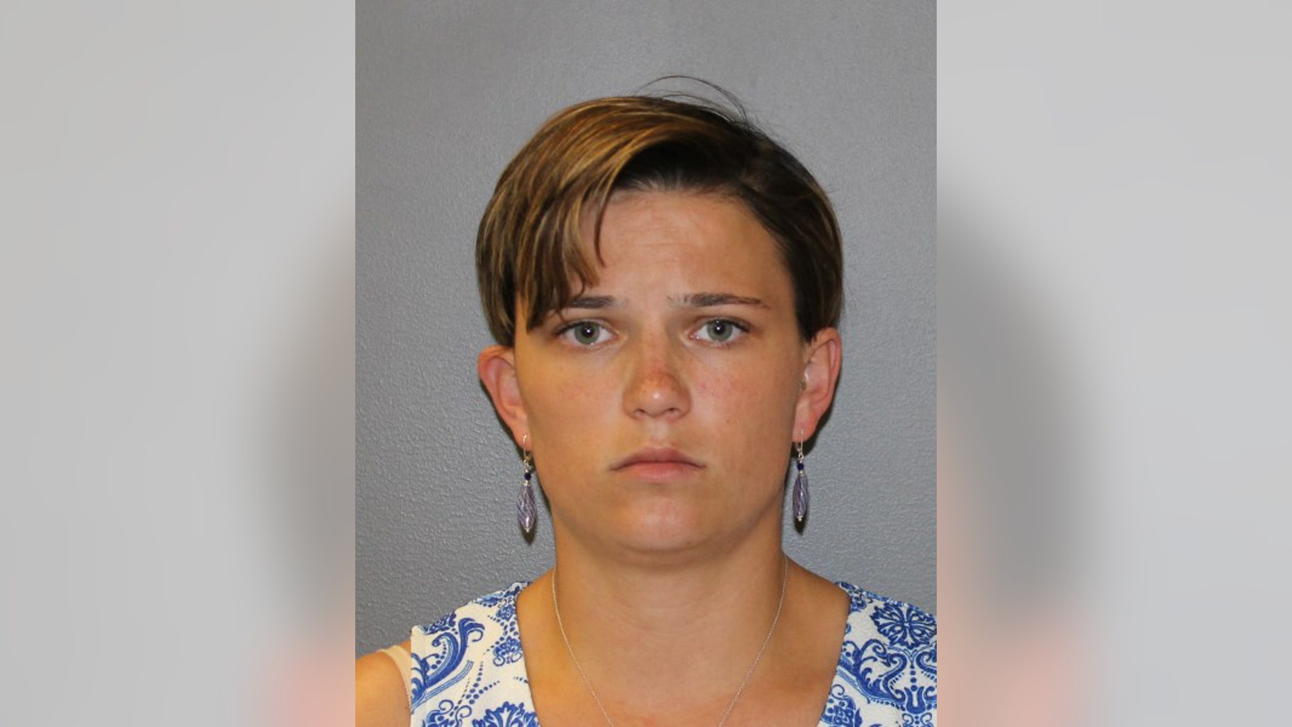 This undated photo provided by the Hamden Police Department shows Danielle Shea of Quincy, Mass. Police have arrested Shea, 22, who they say phoned in bomb threats to Quinnipiac University to try and have commencement ceremonies canceled so her family wouldn't know she wasn't graduating. Shea is being held on $20,000 bond after giving police a detailed confession Sunday, May 18, 2014. (AP Photo/Hamden Police Department)