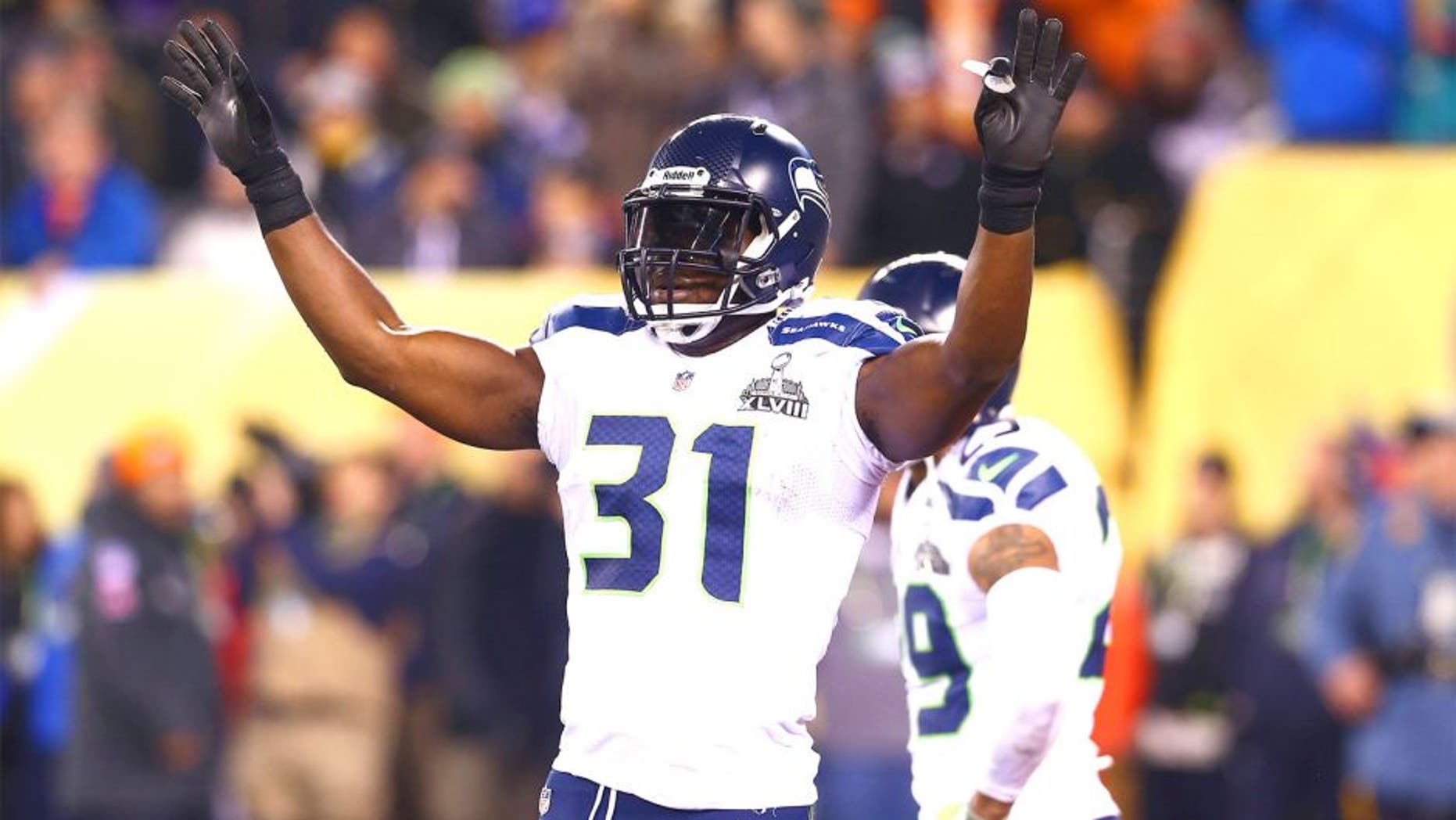 Feb 2, 2014; East Rutherford, NJ, USA; Seattle Seahawks defensive back Kam Chancellor (31) reacts against the Denver Broncos in Super Bowl XLVIII at MetLife Stadium. Mandatory Credit: Mark J. Rebilas-USA TODAY Sports