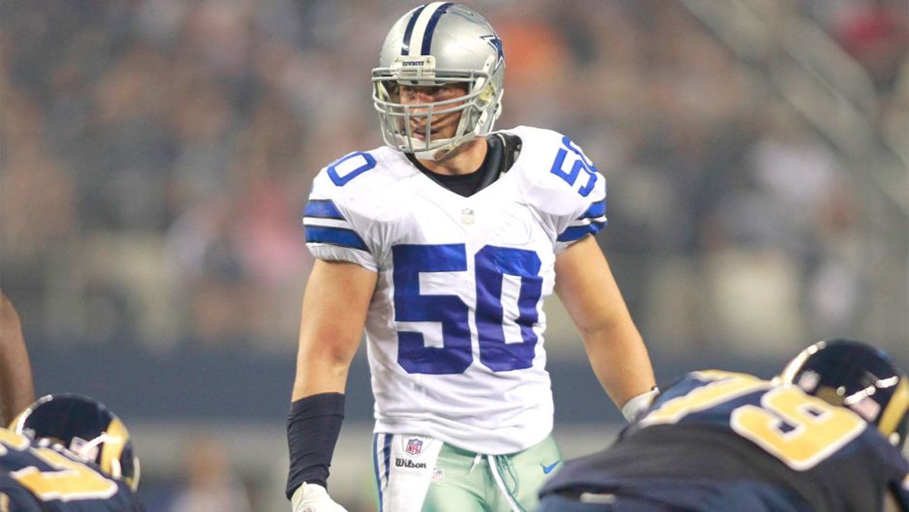 Aug 25, 2012; Arlington, TX, USA; Dallas Cowboys linebacker Sean Lee (50) on the line of scrimmage during the second quarter against the St Louis Rams at Cowboys Stadium. Mandatory Credit: Tim Heitman-USA TODAY Sports