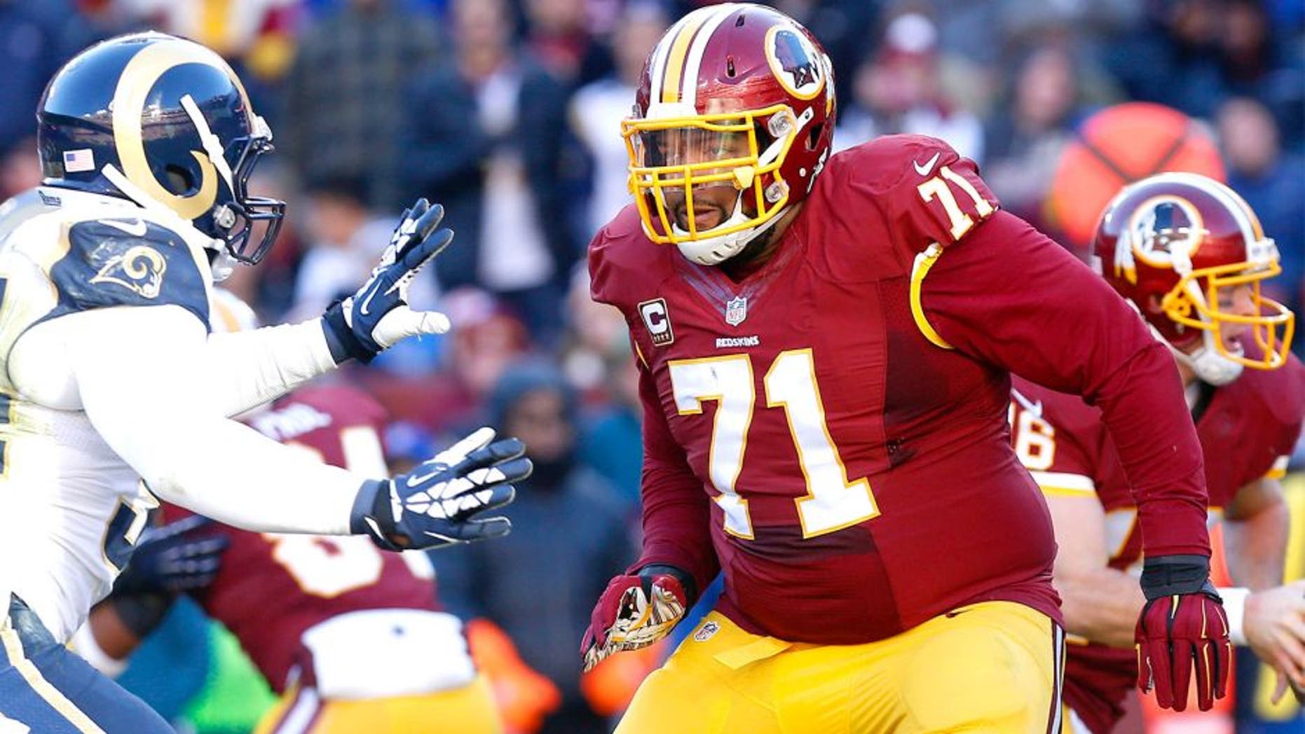 Dec 7, 2014; Landover, MD, USA; Washington Redskins tackle Trent Williams (71) blocks against the St. Louis Rams at FedEx Field. Mandatory Credit: Geoff Burke-USA TODAY Sports