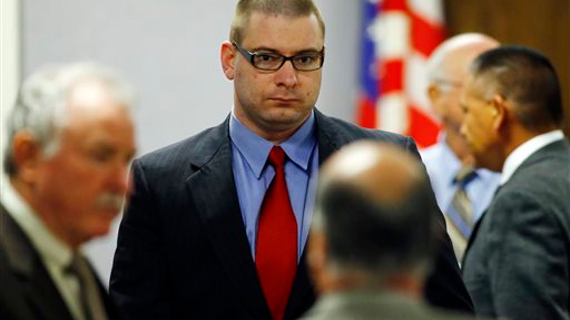 Eddie Ray Routh enters the courtroom following a break in his capital murder trial at the Erath County, Donald R. Jones Justice Center in Stephenville, Texas, Tuesday, Feb. 17, 2015. Routh, of Lancaster, is charged with the 2013 deaths of former Navy SEAL Chris Kyle and his friend Chad Littlefield at a shooting range near Glen Rose, Texas. (AP Photo/Mike Stone, Pool)