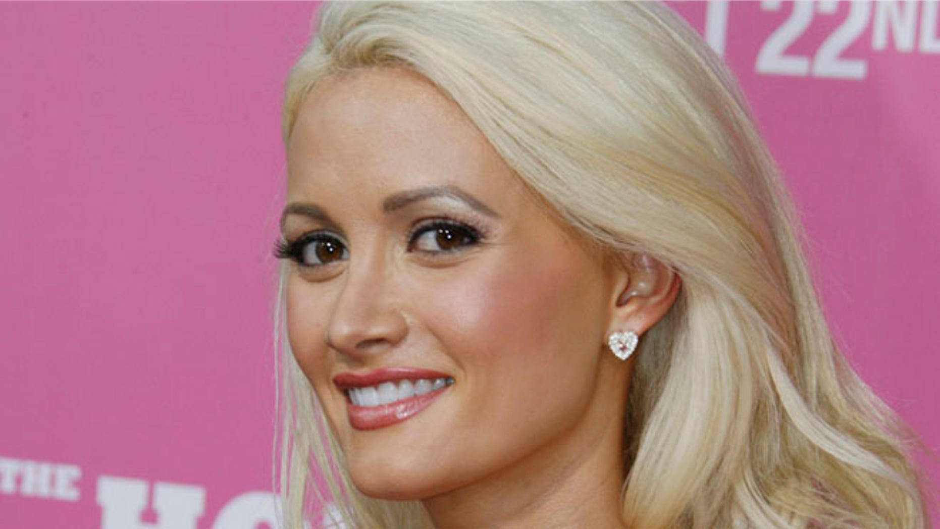 Aug. 20, 2008: Playboy Playmate Holly Madison, cast member of the comedy film "The House Bunny", poses at the film's premiere in Los Angeles.