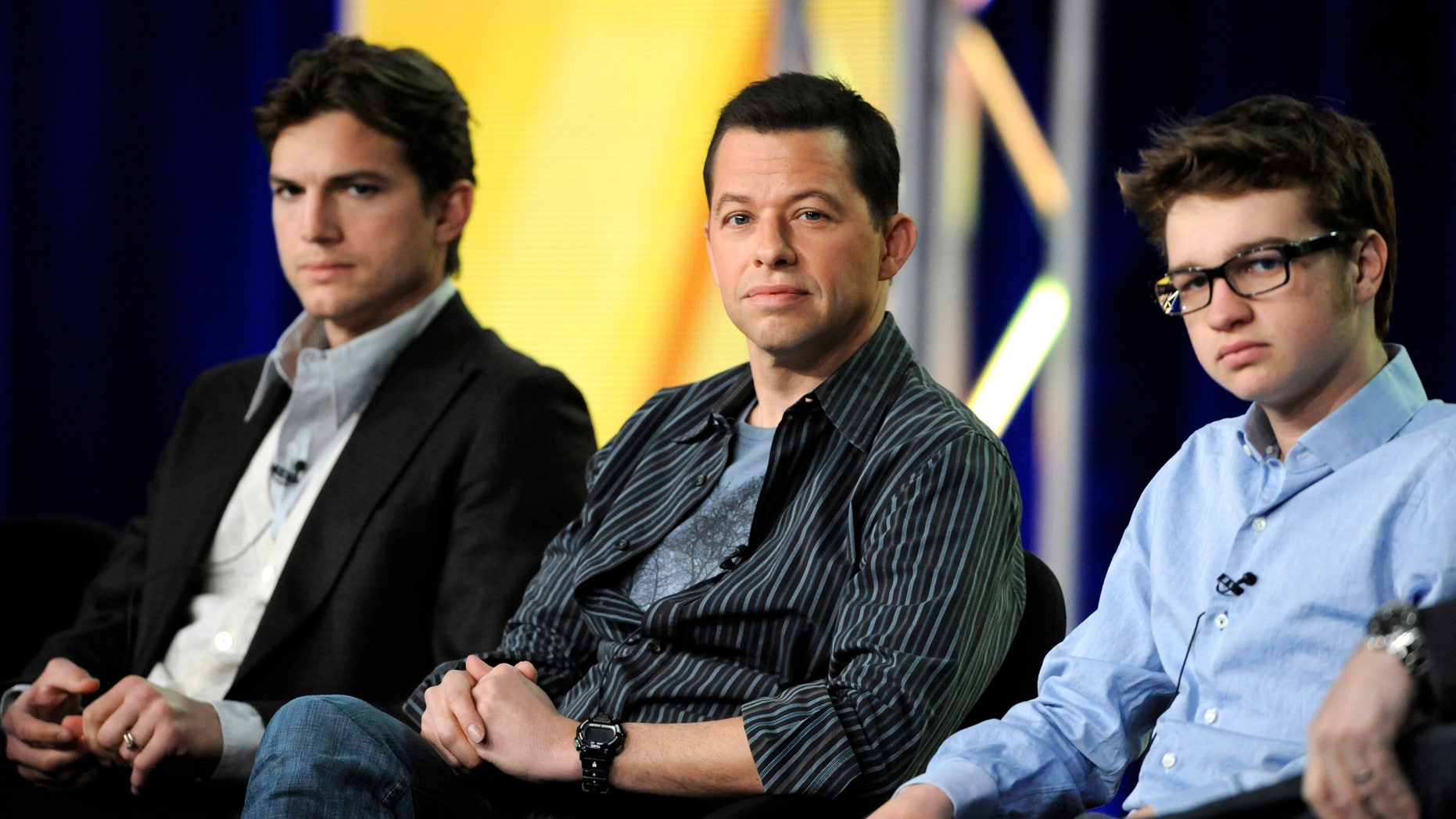 Jan. 11, 2012: Cast members Ashton Kutcher (L), Jon Cryer (C) and Angus T. Jones (R) participate in a panel for CBS series "Two and a Half Men" during the CBS sessions at the Television Critics Association winter press tour in Pasadena, Calif.