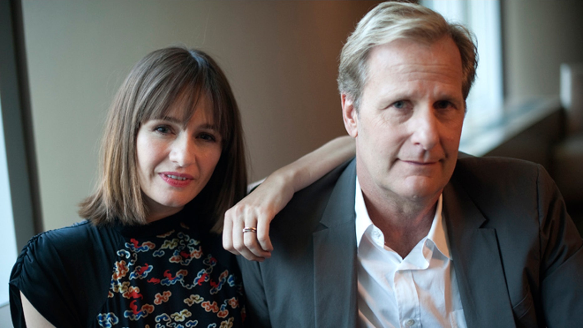 May 17, 2012: Cast members Emily Mortimer and Jeff Daniels (R) pose for a photo at the offices of HBO in New York.