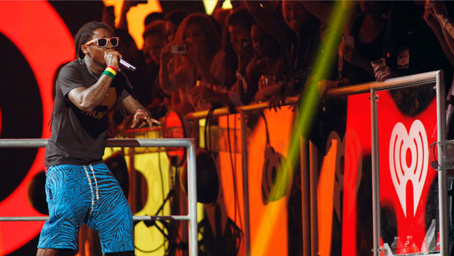 Sept. 21, 2012: Rapper Lil Wayne performs during the 2012 iHeart Radio Music Festival at the MGM Grand Garden Arena in Las Vegas, Nevada.