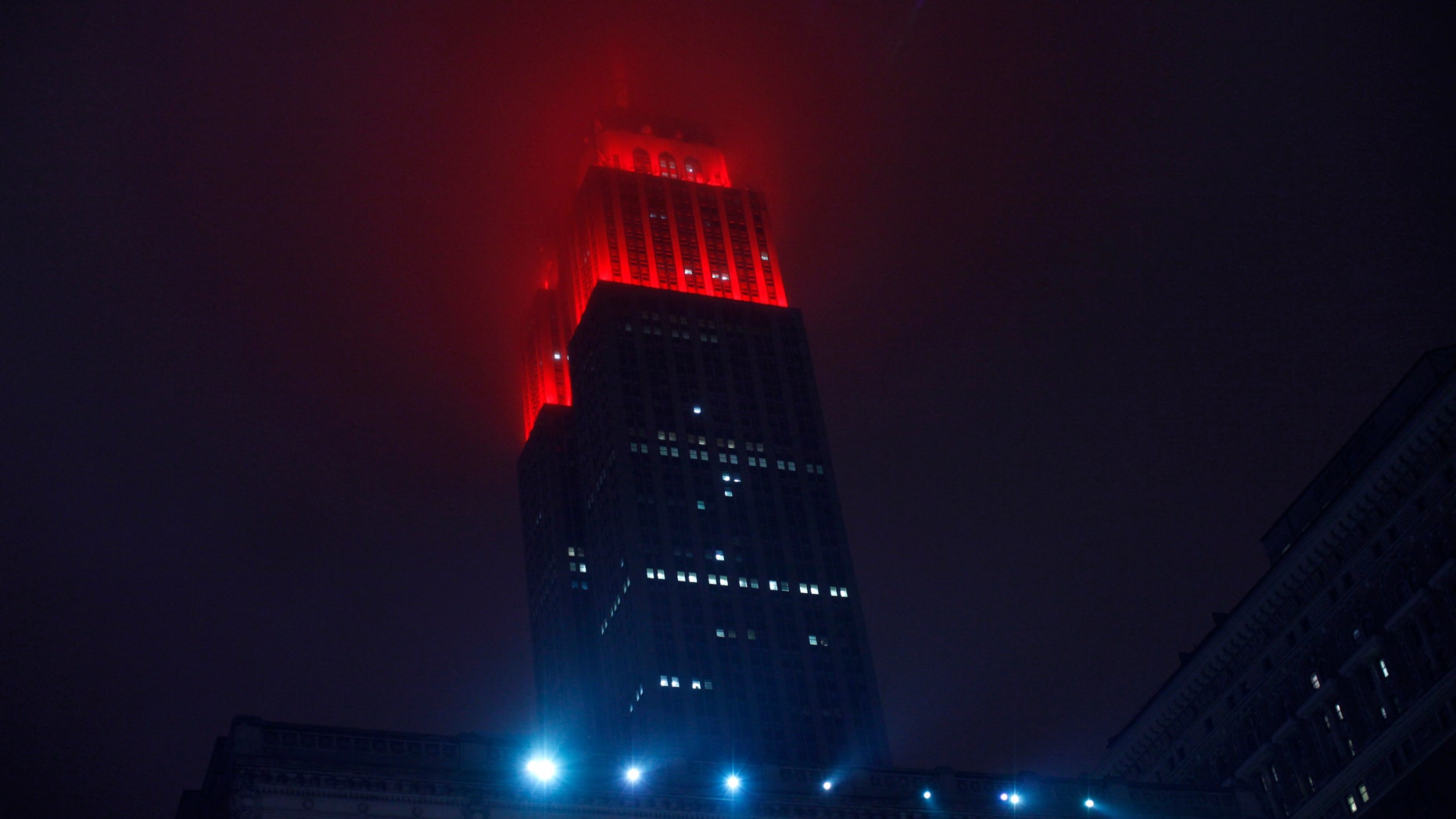 The Empire State Building is lit up in red in honor of World AIDS Day in New York December 1, 2012. (REUTERS/Eduardo Munoz)