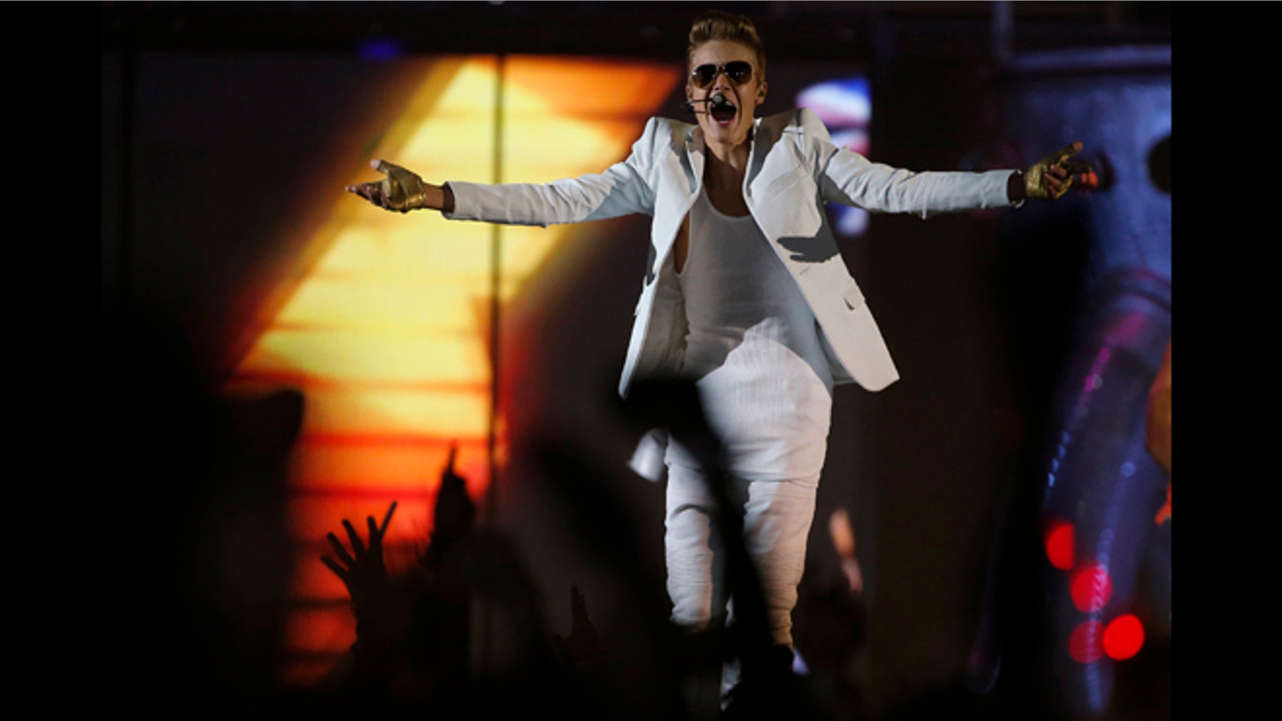 Feb. 21, 2013: Canadian singer Justin Bieber performs in a concert at the Manchester Arena in Manchester, northern England.