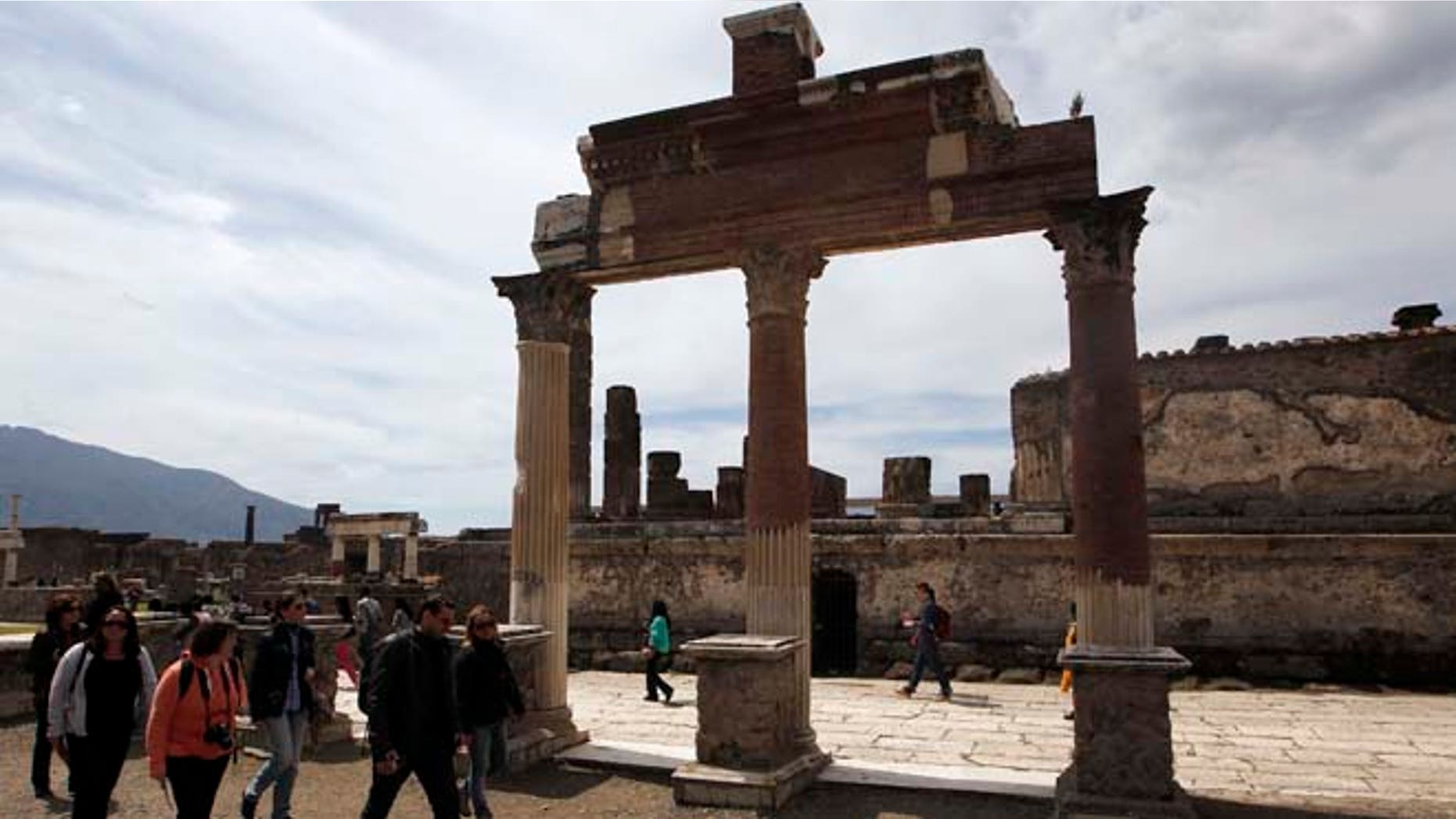 April 17, 2015: People visit the ruins at the ancient archaeological site of Pompeii.