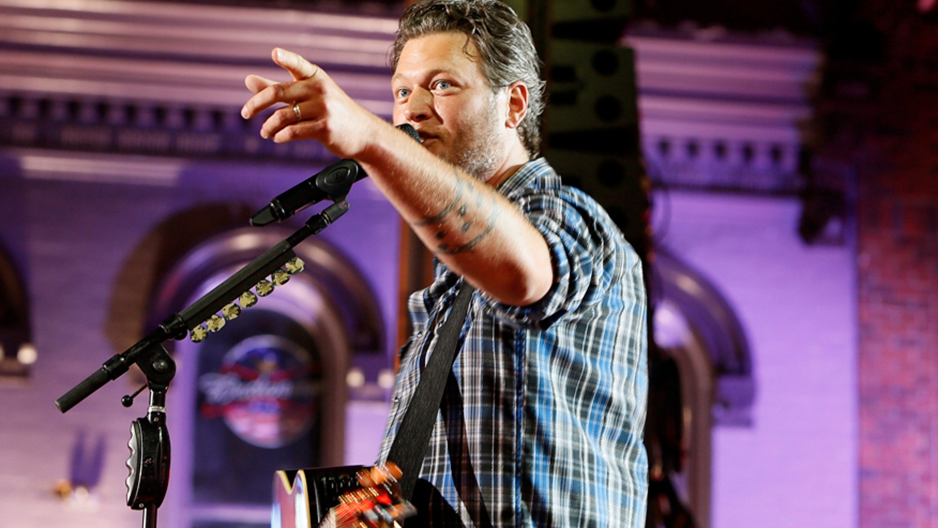 Musician Blake Shelton performs "Boys 'Round Here" during the 2014 CMT Music Awards in Nashville, Tennessee June 4, 2014.