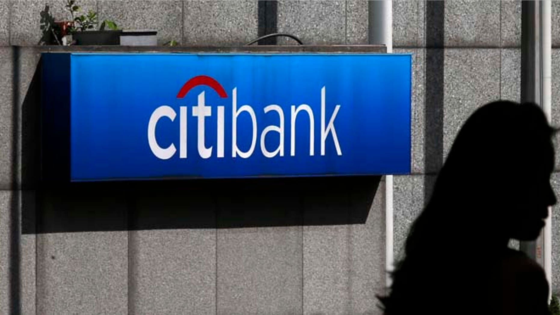 The Wall Street Journal reports that Citigroup Inc. and Bank of America Corp. have cut the pools of bonus money set aside for traders and other employees.