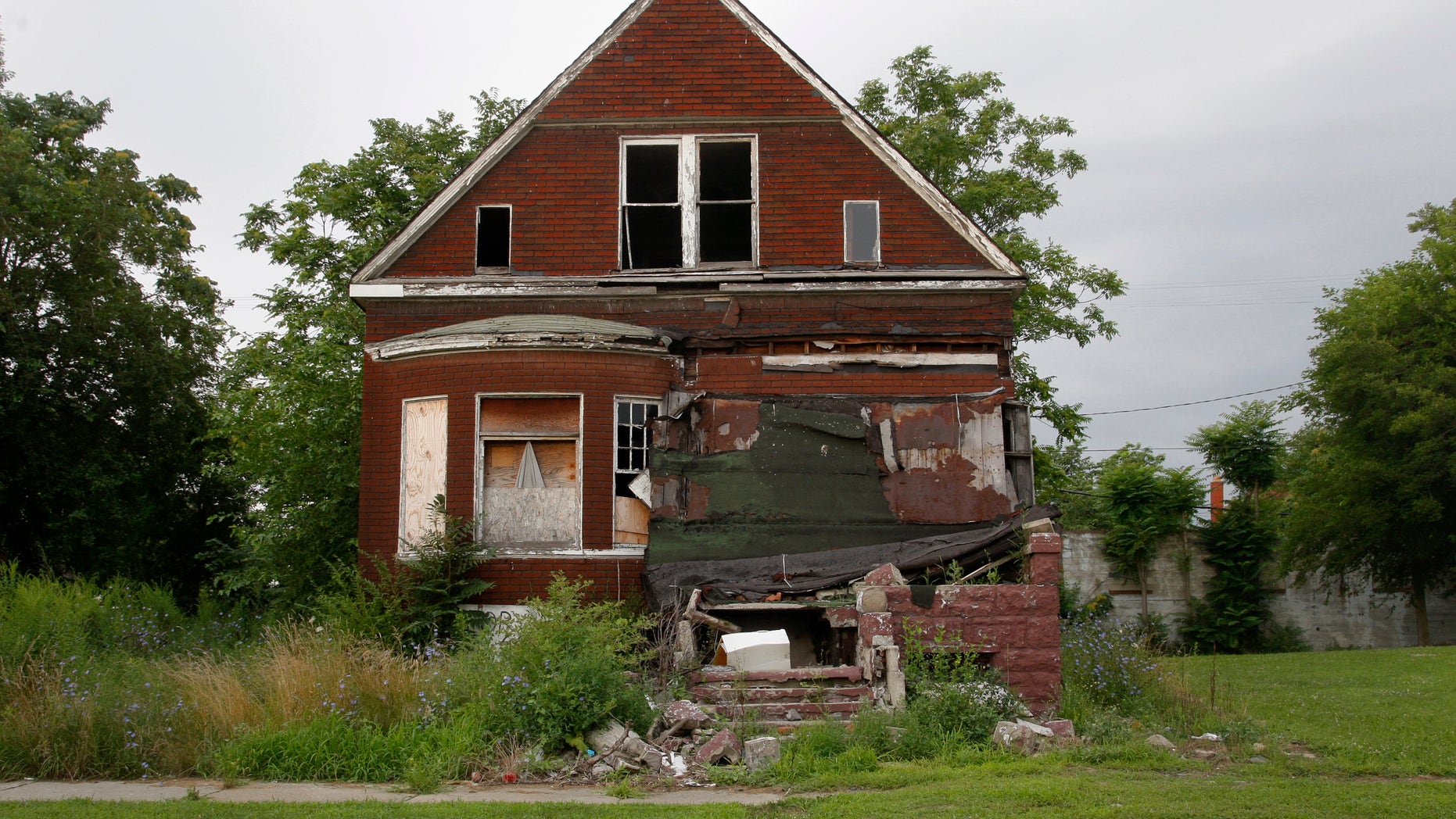 July 23, 2013 - A vacant blighted home is seen on a street that was once lined with houses in Detroit, Michigan.