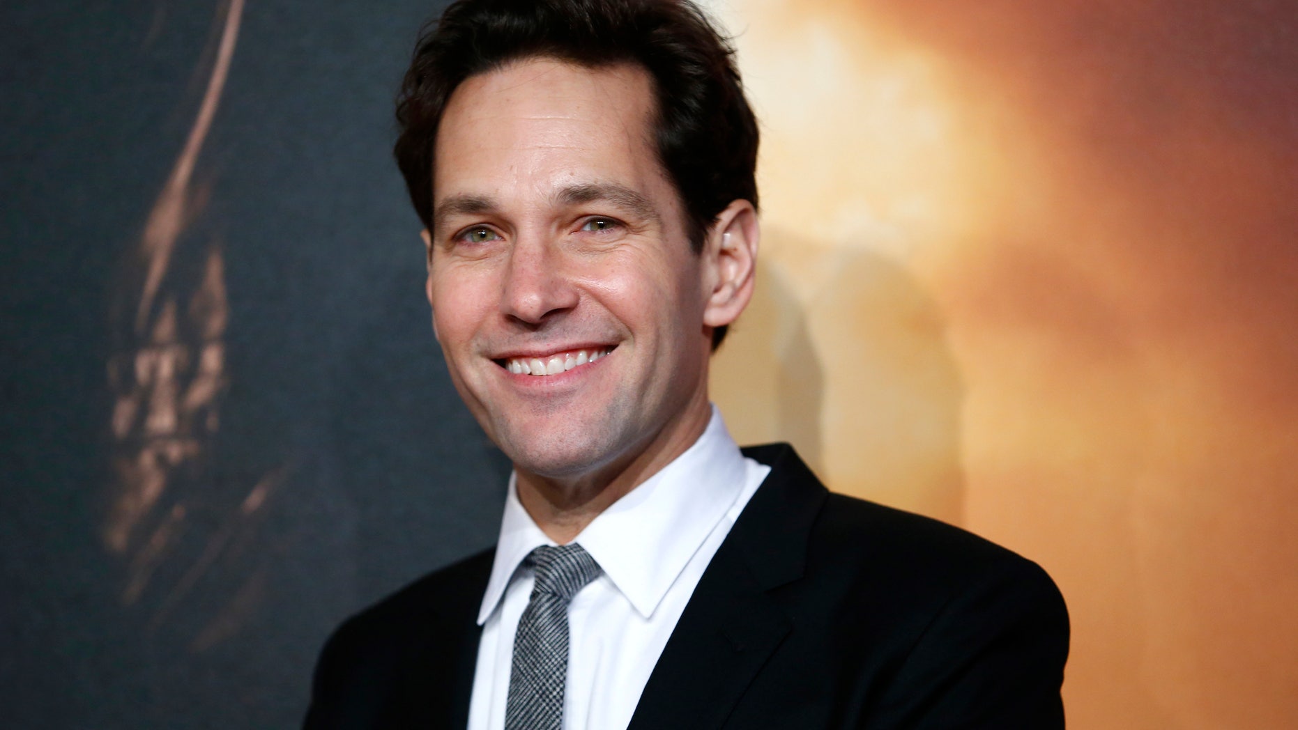 Actor Paul Rudd poses at the UK Premiere of the film Anchorman 2 in Leicester Square, London, December 11, 2013. REUTERS/Andrew Winning (BRITAIN - Tags: ENTERTAINMENT) - RTX16E9M
